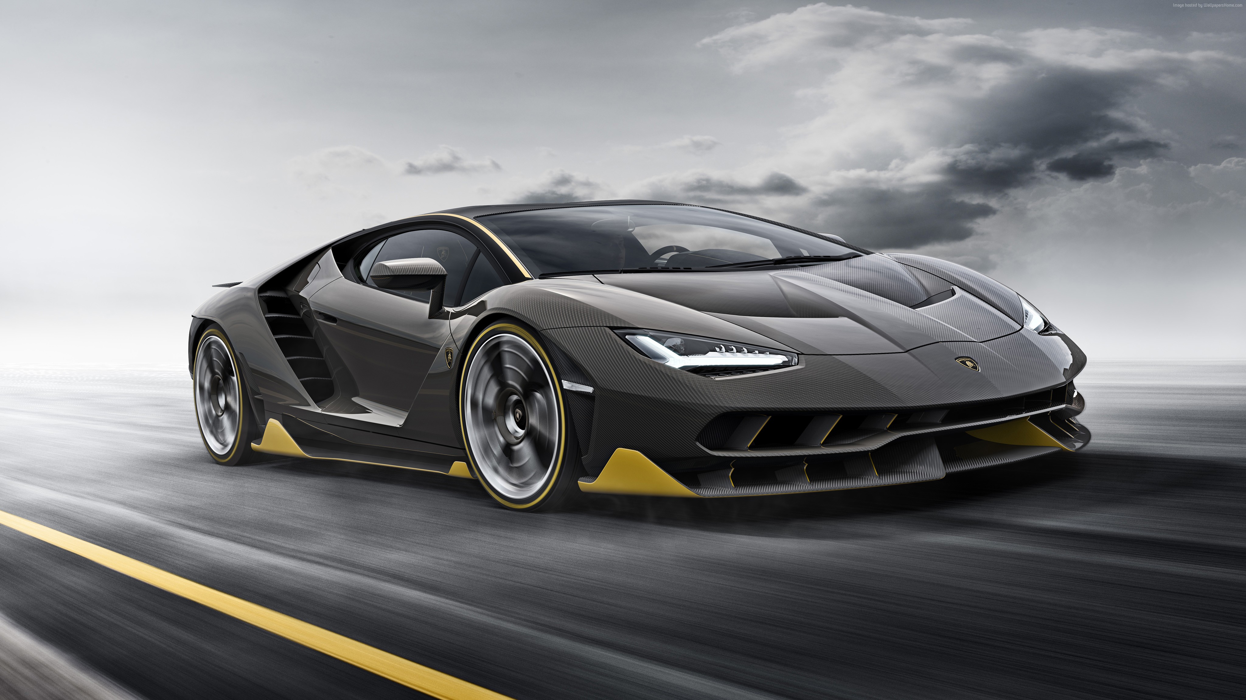 Lamborghini Centenario driving on a road HD Wallpaper