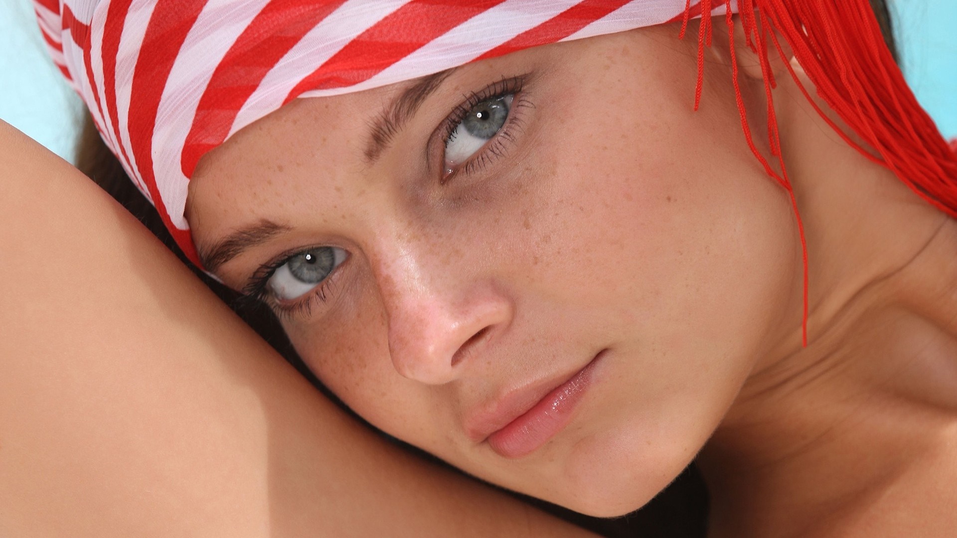 Close up portrait of a woman with blue eyes and freckles HD Wallpaper
