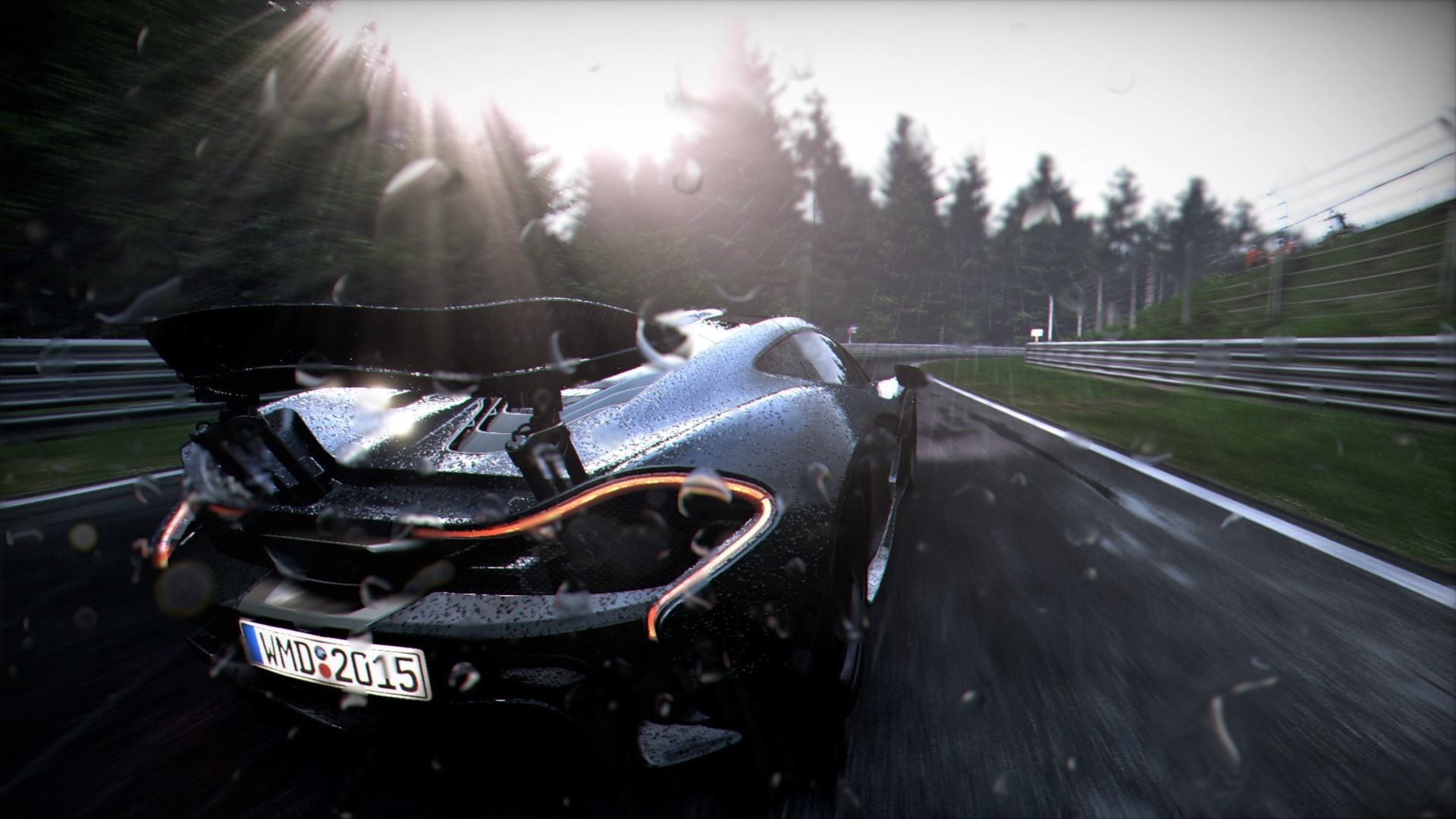 McLaren P1 driving on a wet race track HD Wallpaper