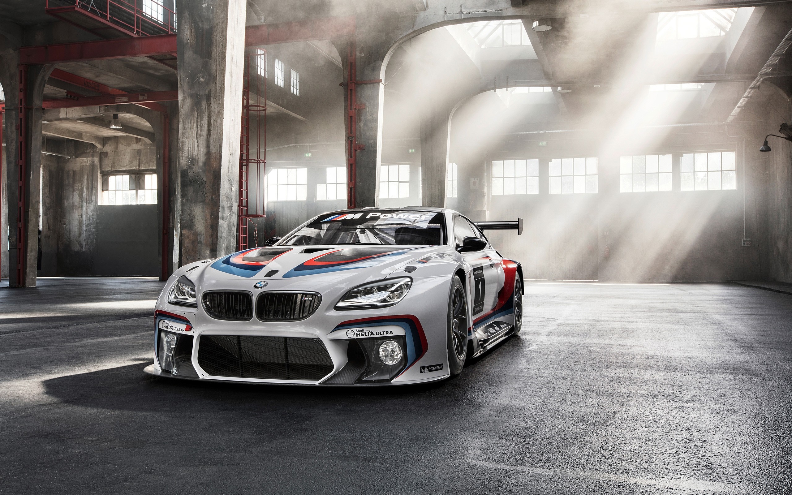 BMW M6 GT3 race car in a garage HD Wallpaper