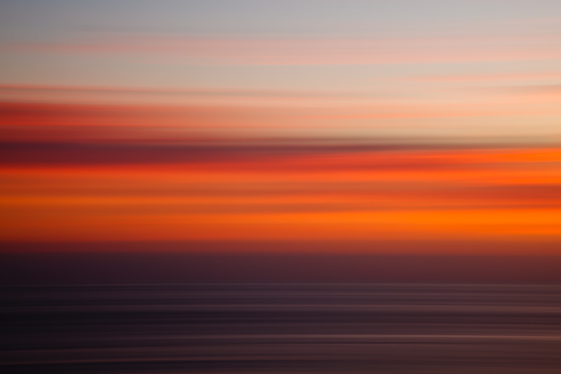 Abstract sunset over the ocean with panning effect HD Wallpaper