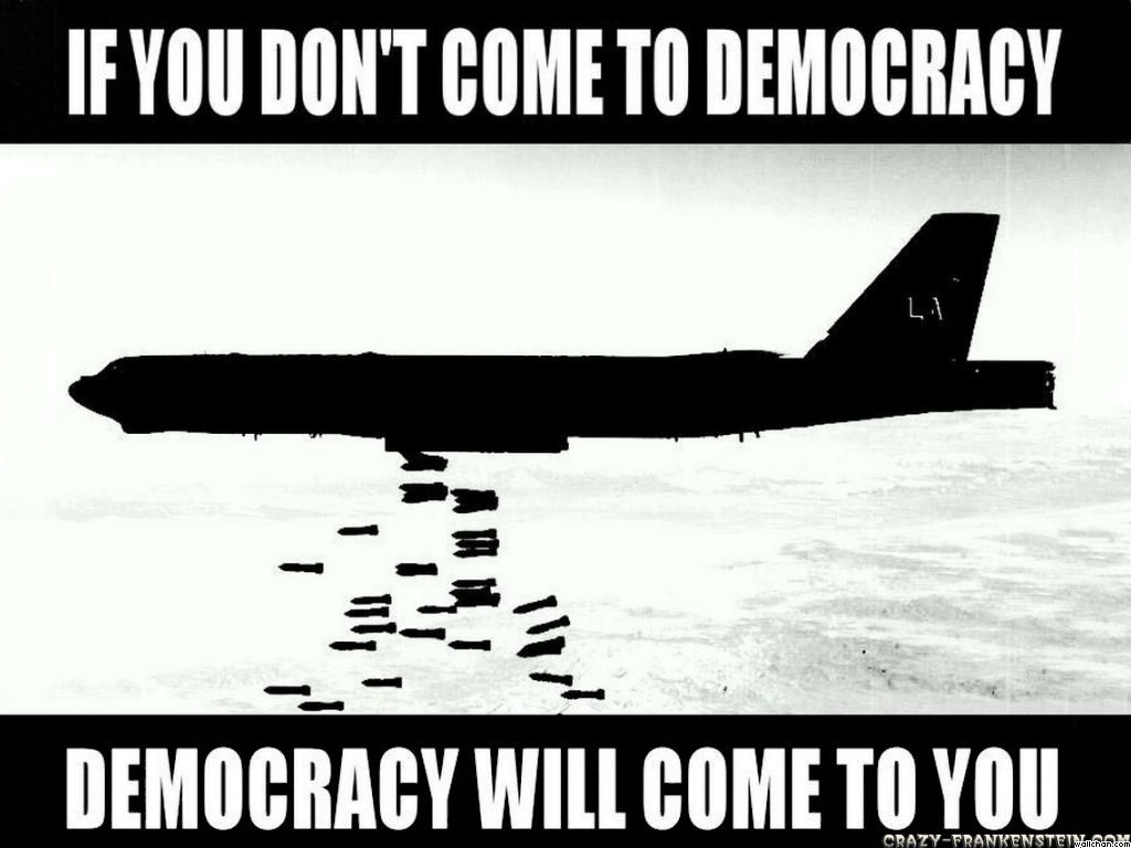 Airplane dropping bombs with text about democracy HD Wallpaper