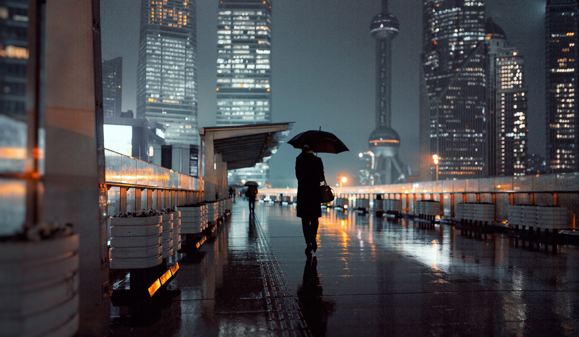 Person with umbrella in Shanghai at night HD Wallpaper