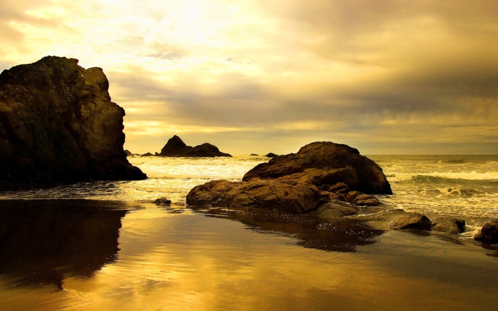 Rocky beach with ocean waves at sunset HD Wallpaper