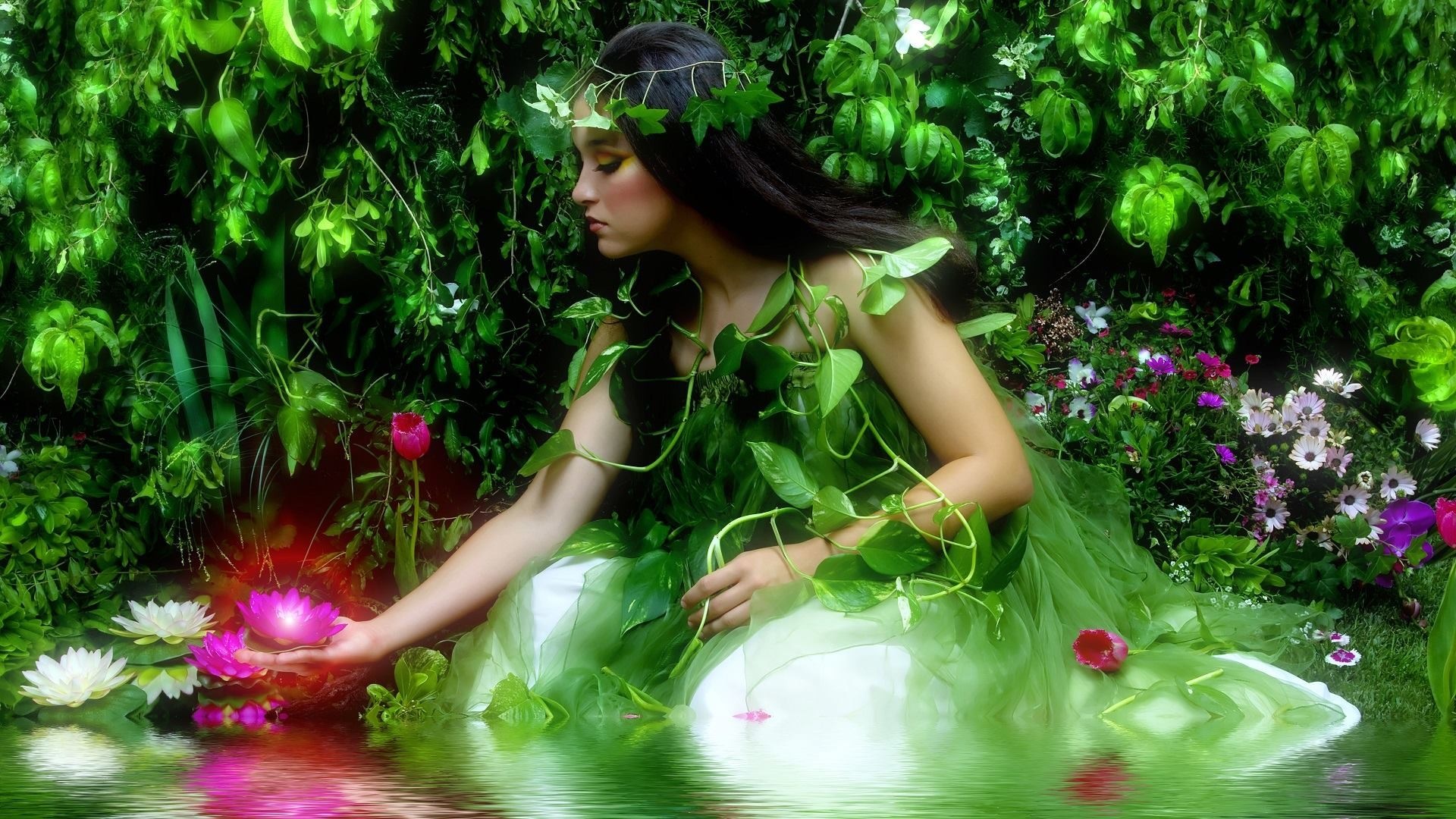Woman in a green dress in a garden with flowers HD Wallpaper