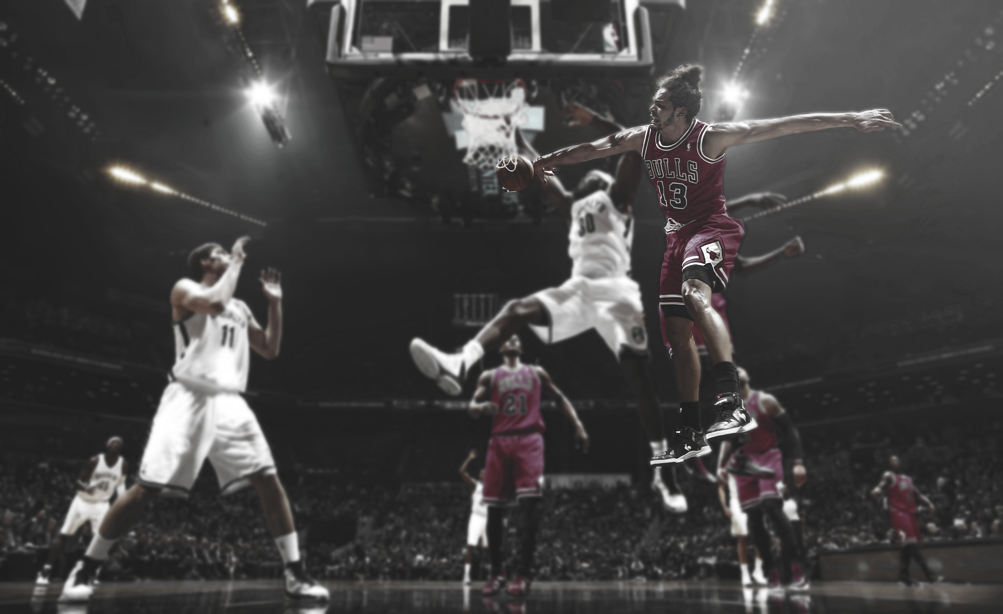 Basketball players in action during a game HD Wallpaper