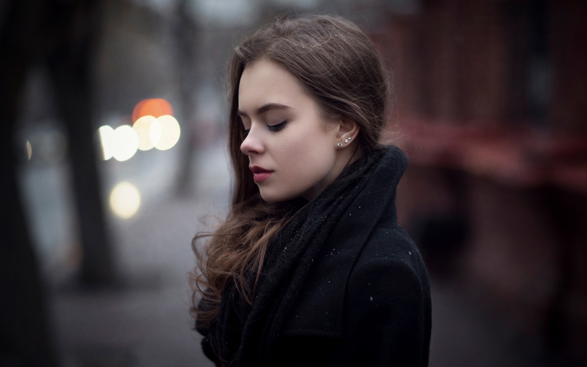 Woman in black coat with brown hair HD Wallpaper