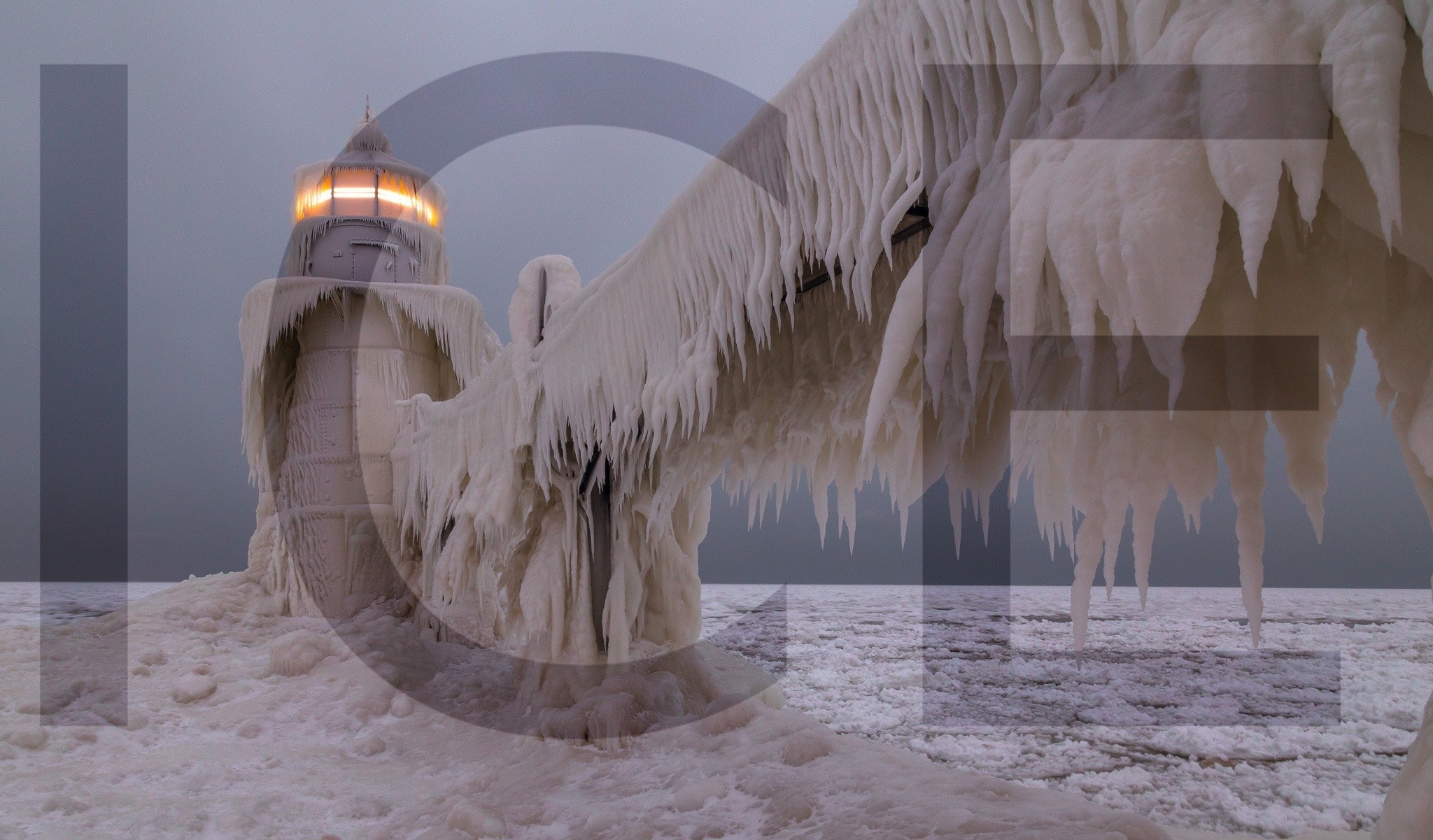 Lighthouse covered in ice HD Wallpaper