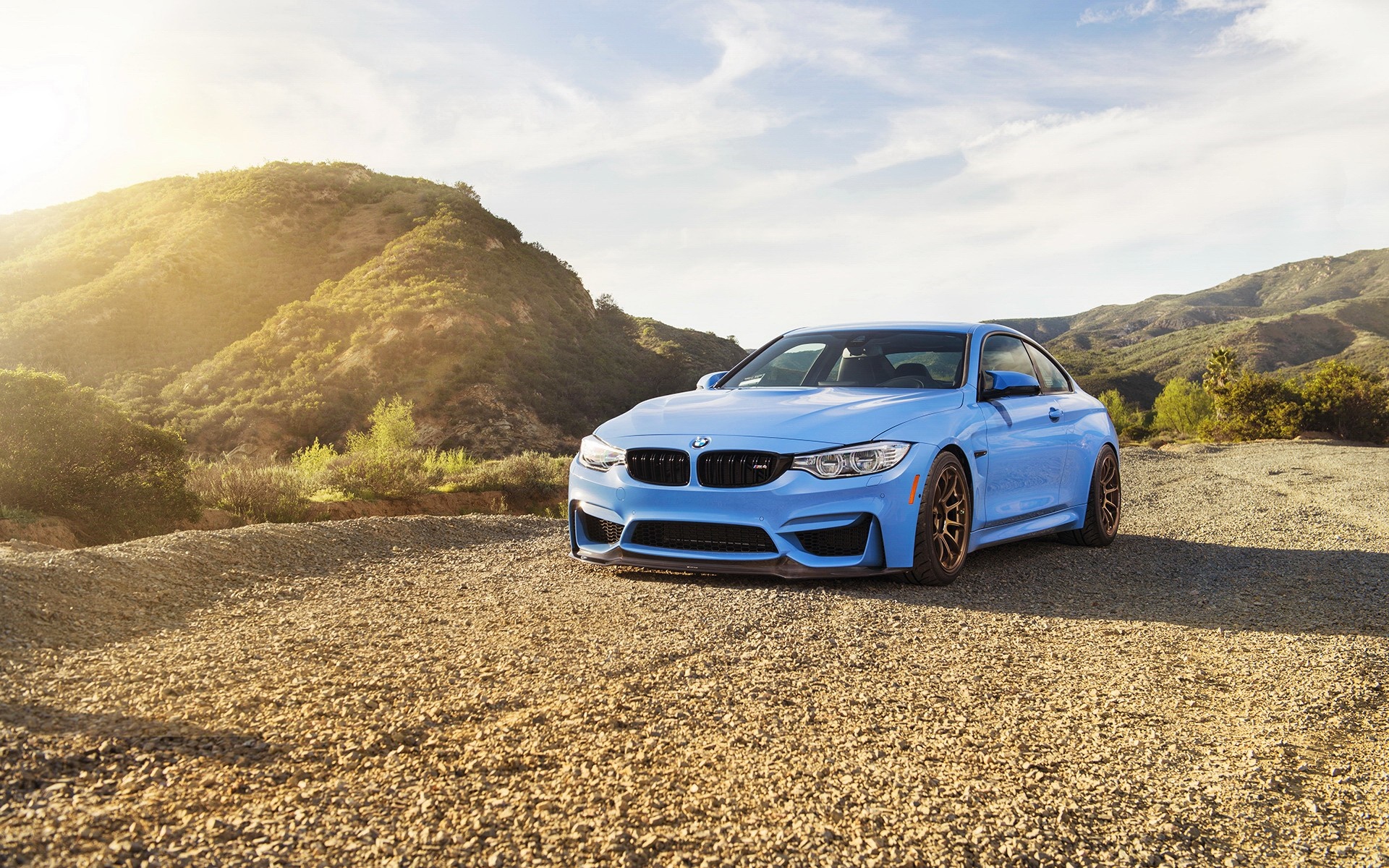 Blue BMW M4 Coupe on Gravel Road with Mountains HD Wallpaper