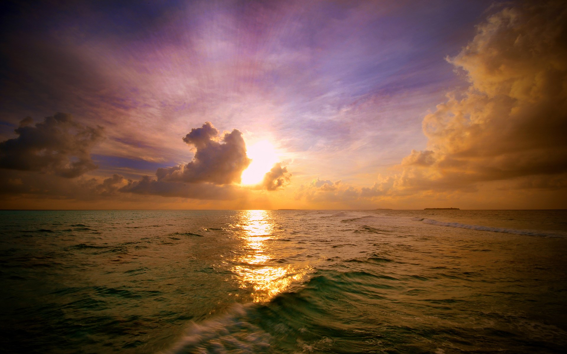 Sunset over the ocean with colorful clouds HD Wallpaper