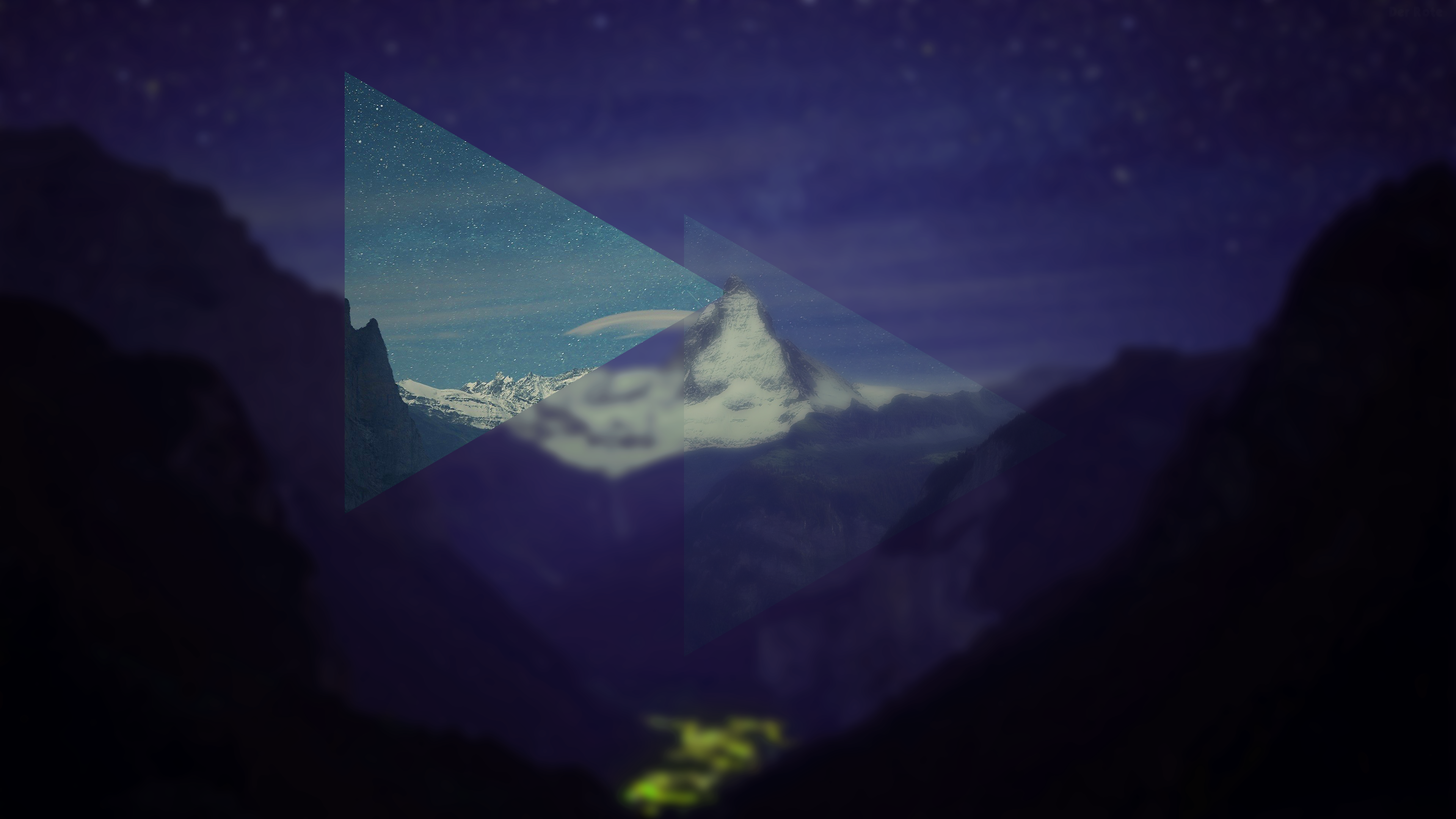 Mountain range at night with city lights HD Wallpaper