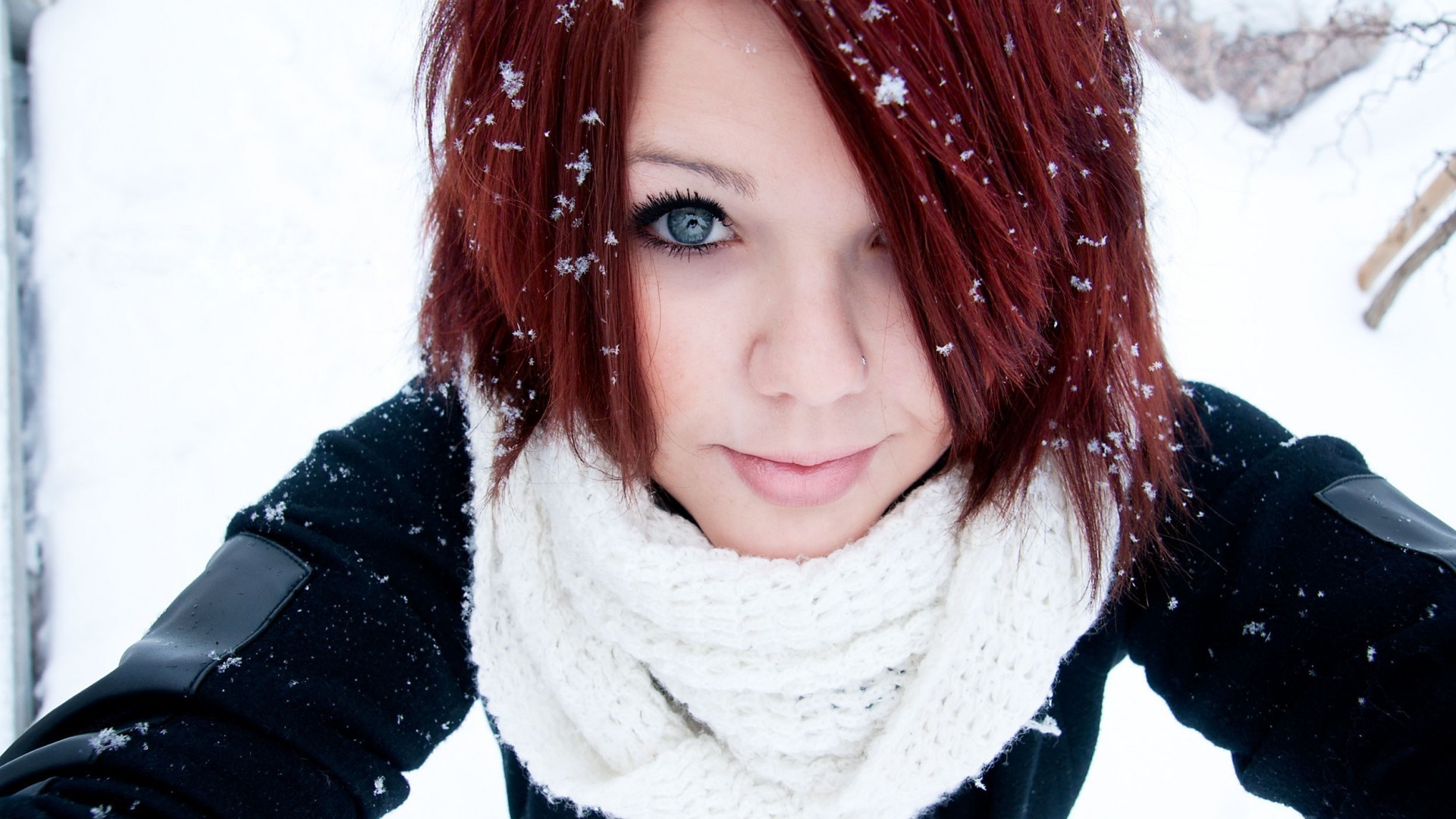 Woman with red hair and blue eyes in the snow HD Wallpaper