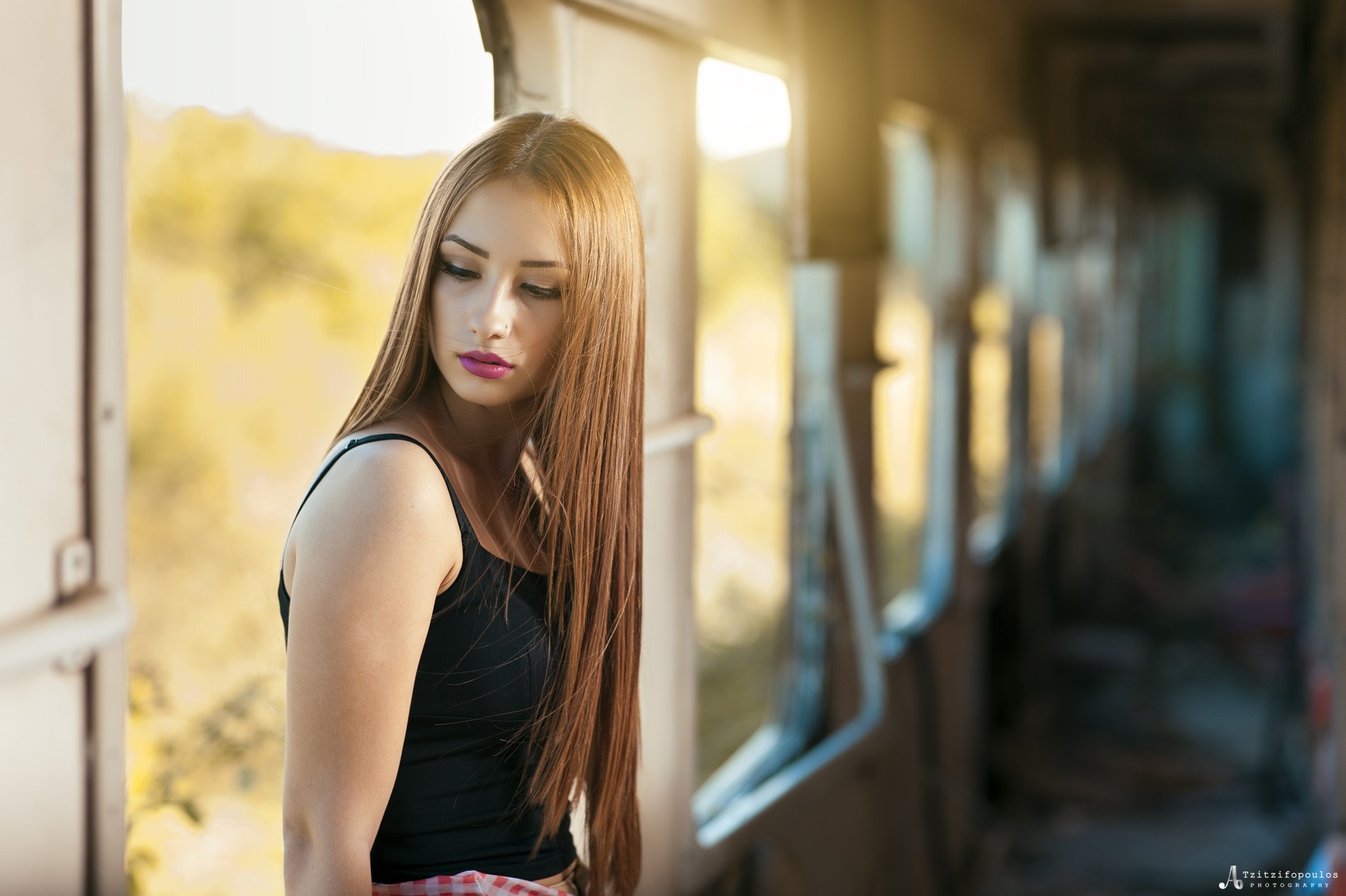 Woman with long brown hair in a black tank top HD Wallpaper