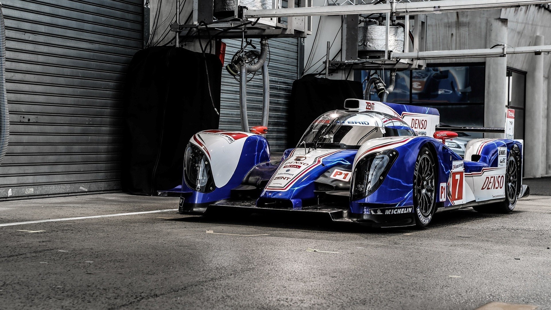 Toyota TS040 Hybrid race car in pit lane HD Wallpaper