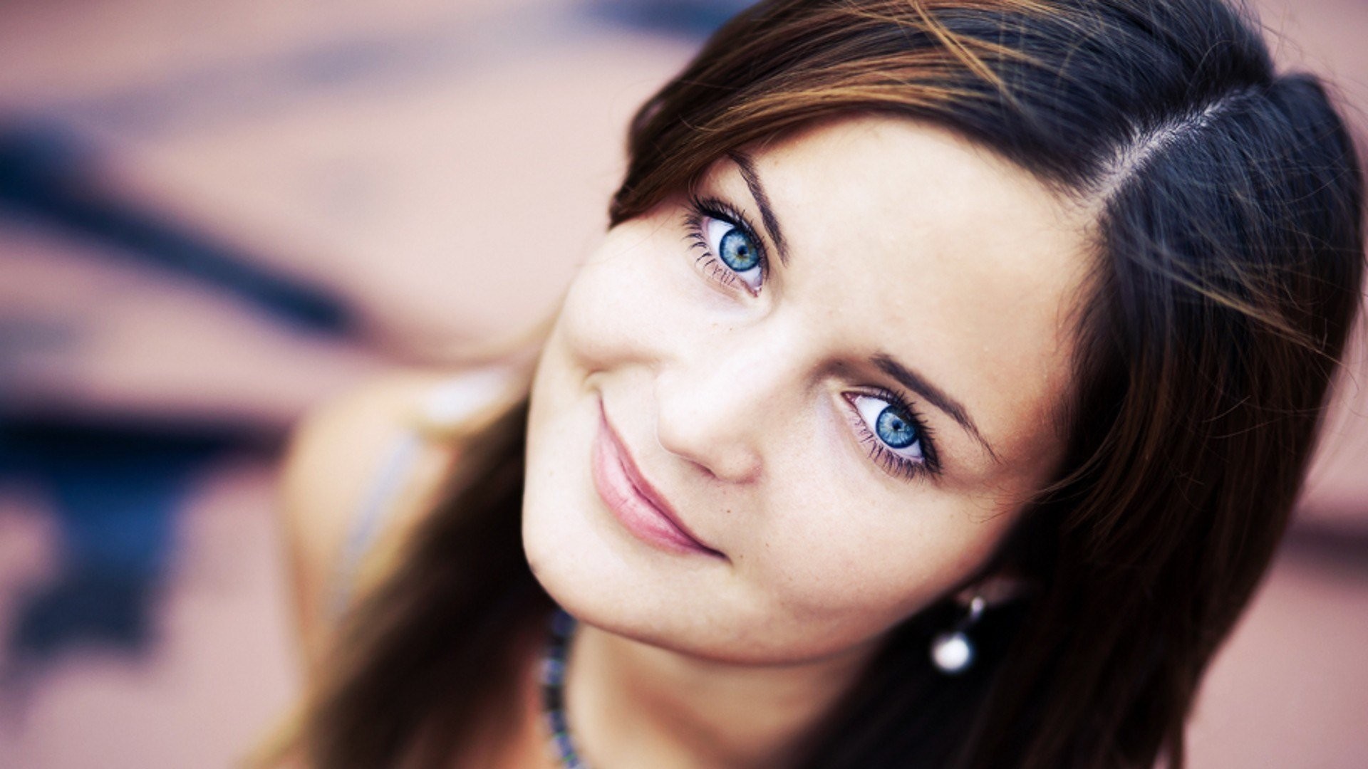 Portrait of Woman with Bright Blue Eyes and Brown Hair HD Wallpaper