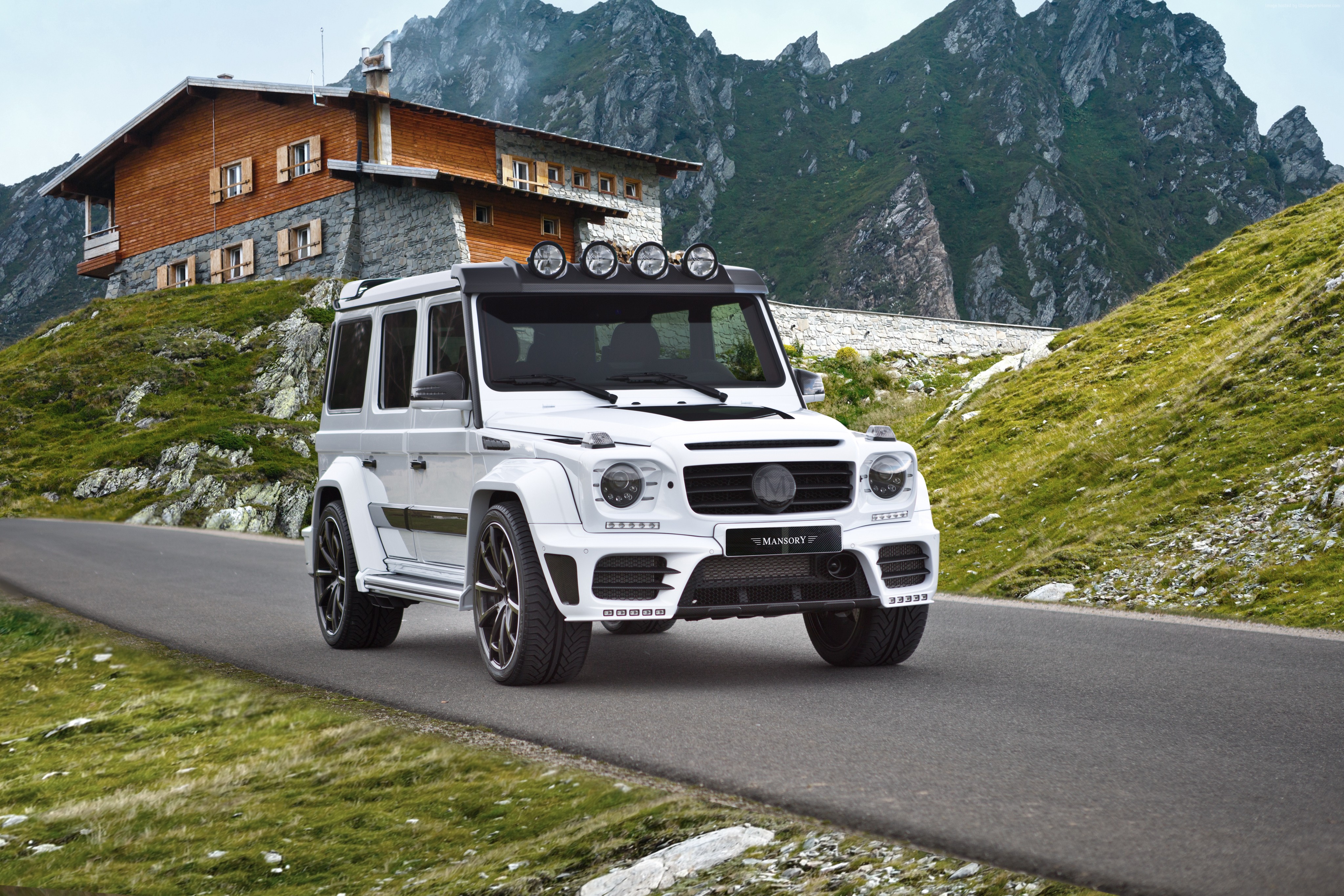 White Mansory Gronos SUV on a mountain road HD Wallpaper