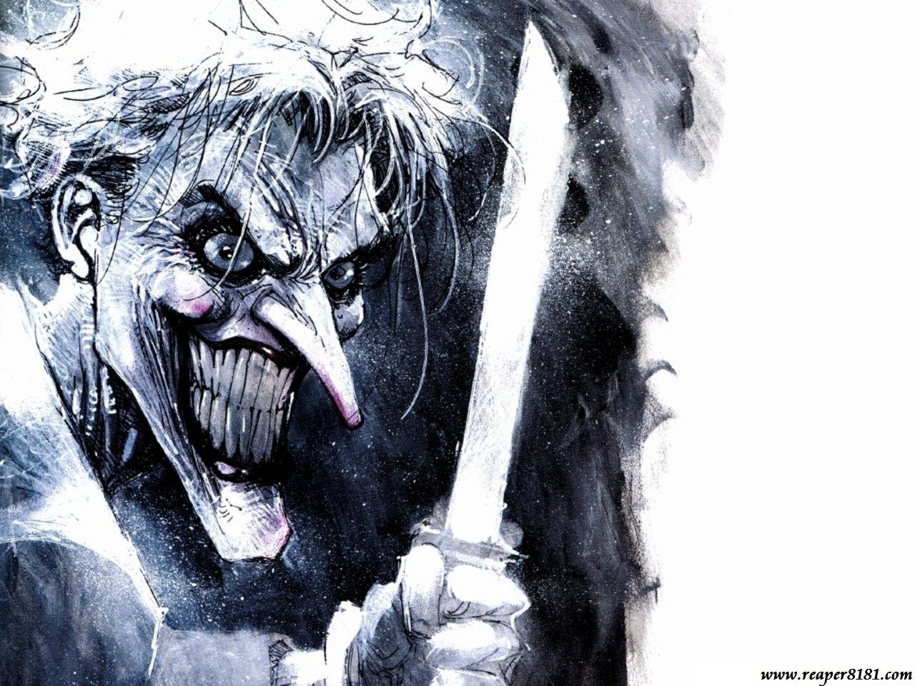 The Joker holding a knife HD Wallpaper