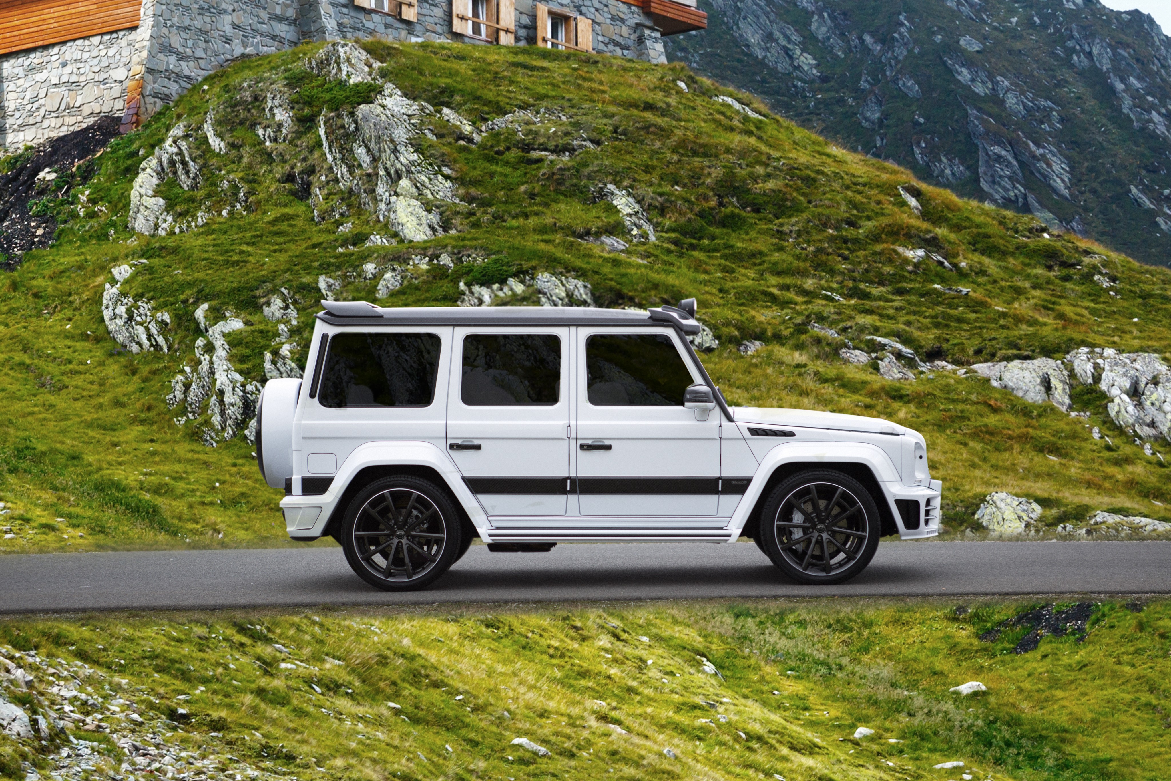 White Mansory Gronos Mercedes G63 SUV on Mountain Road HD Wallpaper