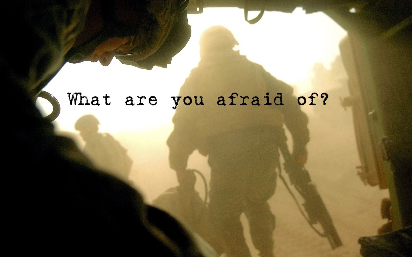 Soldiers in a dusty environment with text HD Wallpaper