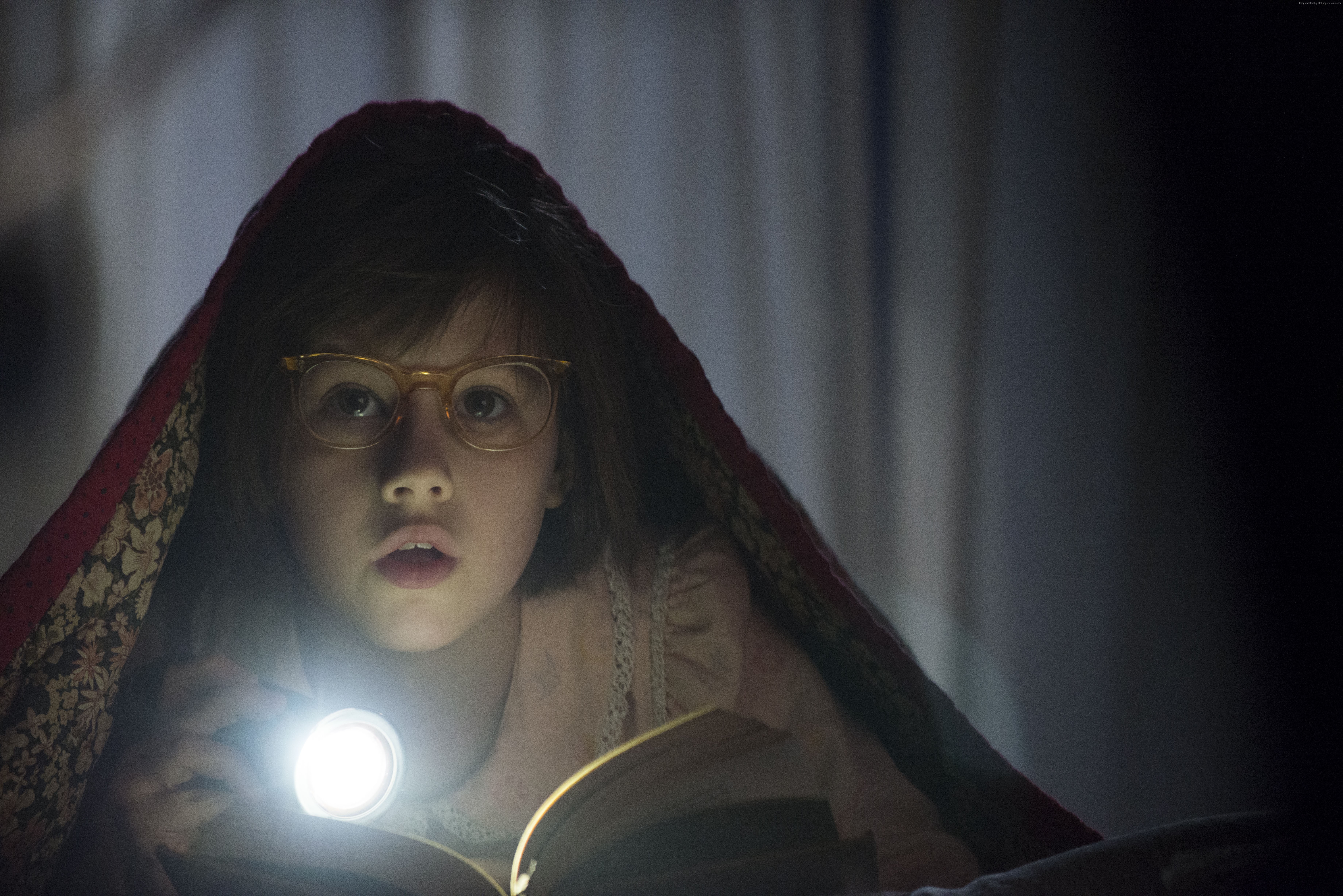 Ruby Barnhill reading with a flashlight HD Wallpaper
