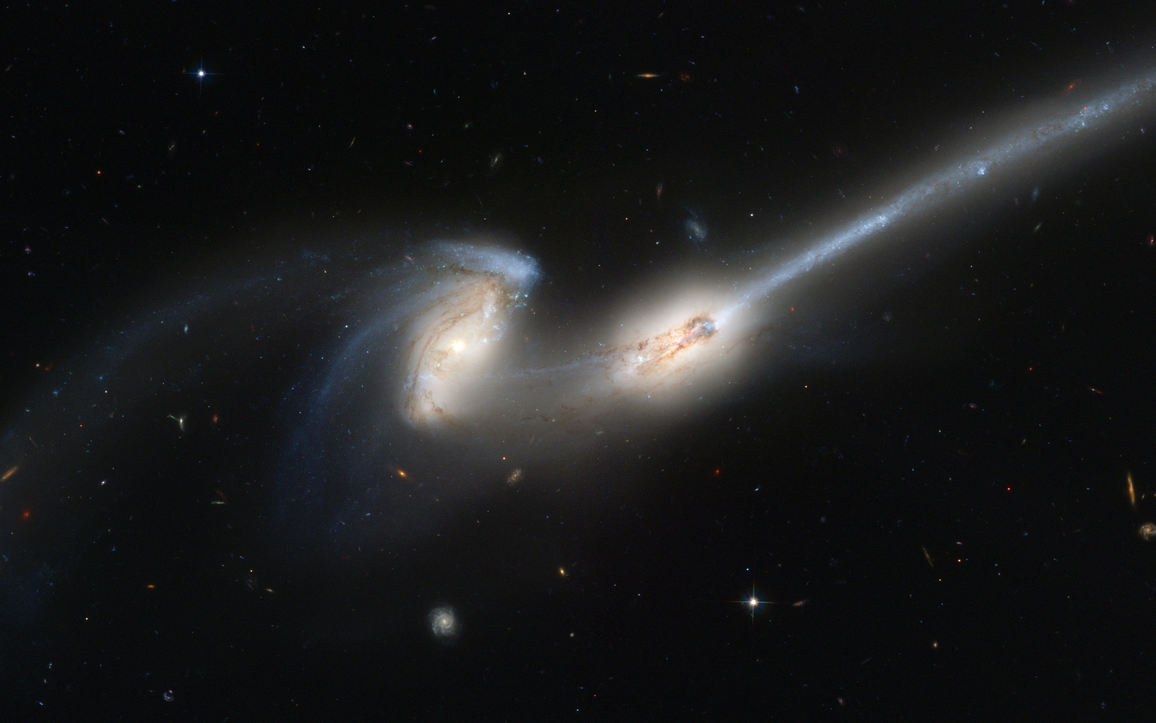 The Mice Galaxies interacting in space HD Wallpaper