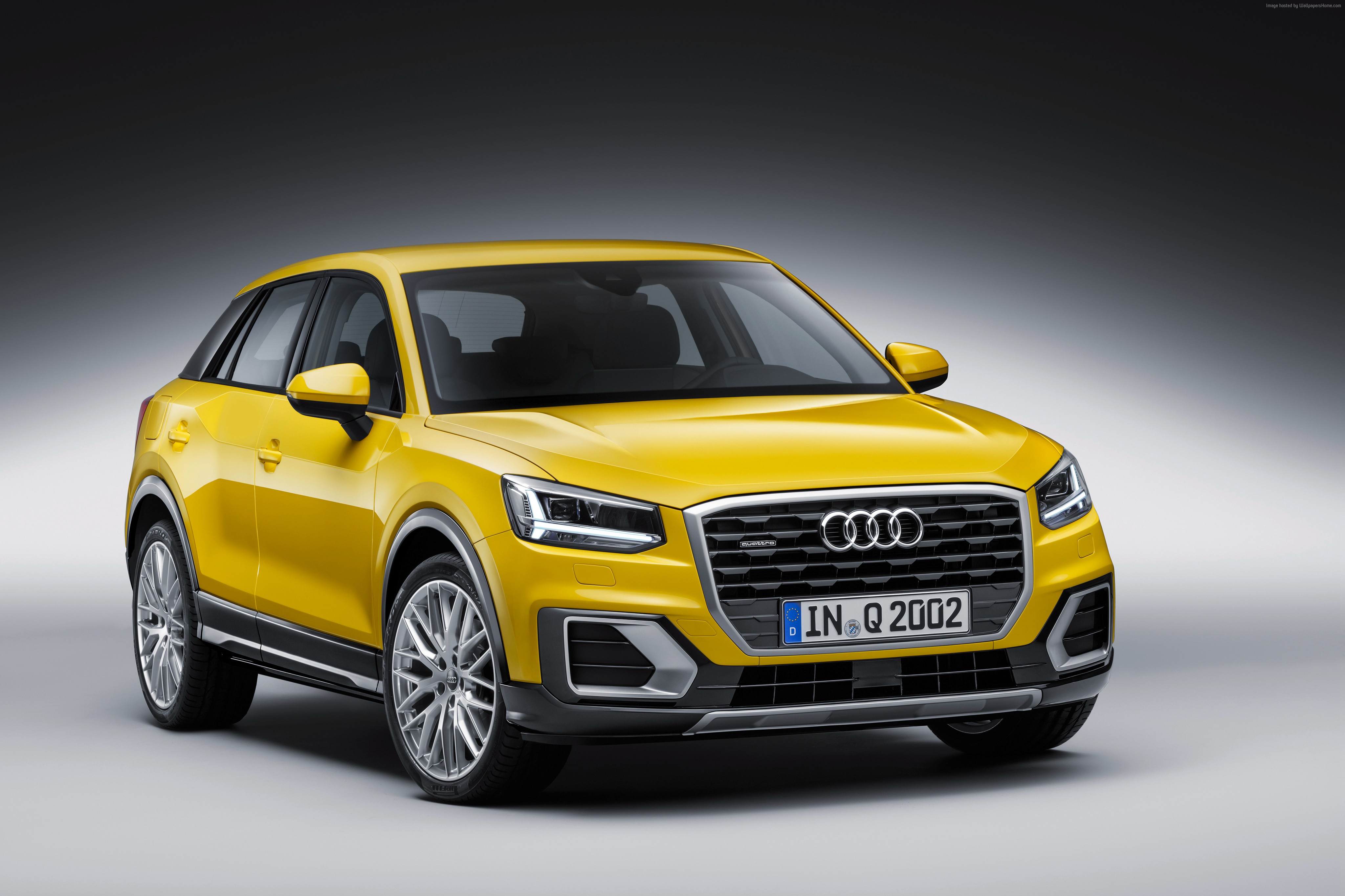 Yellow Audi Q2 TDI quattro crossover HD Wallpaper