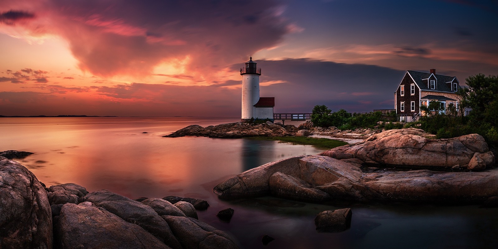 Massachusetts Lighthouse at Sunset Over Rocky Shore HD Wallpaper