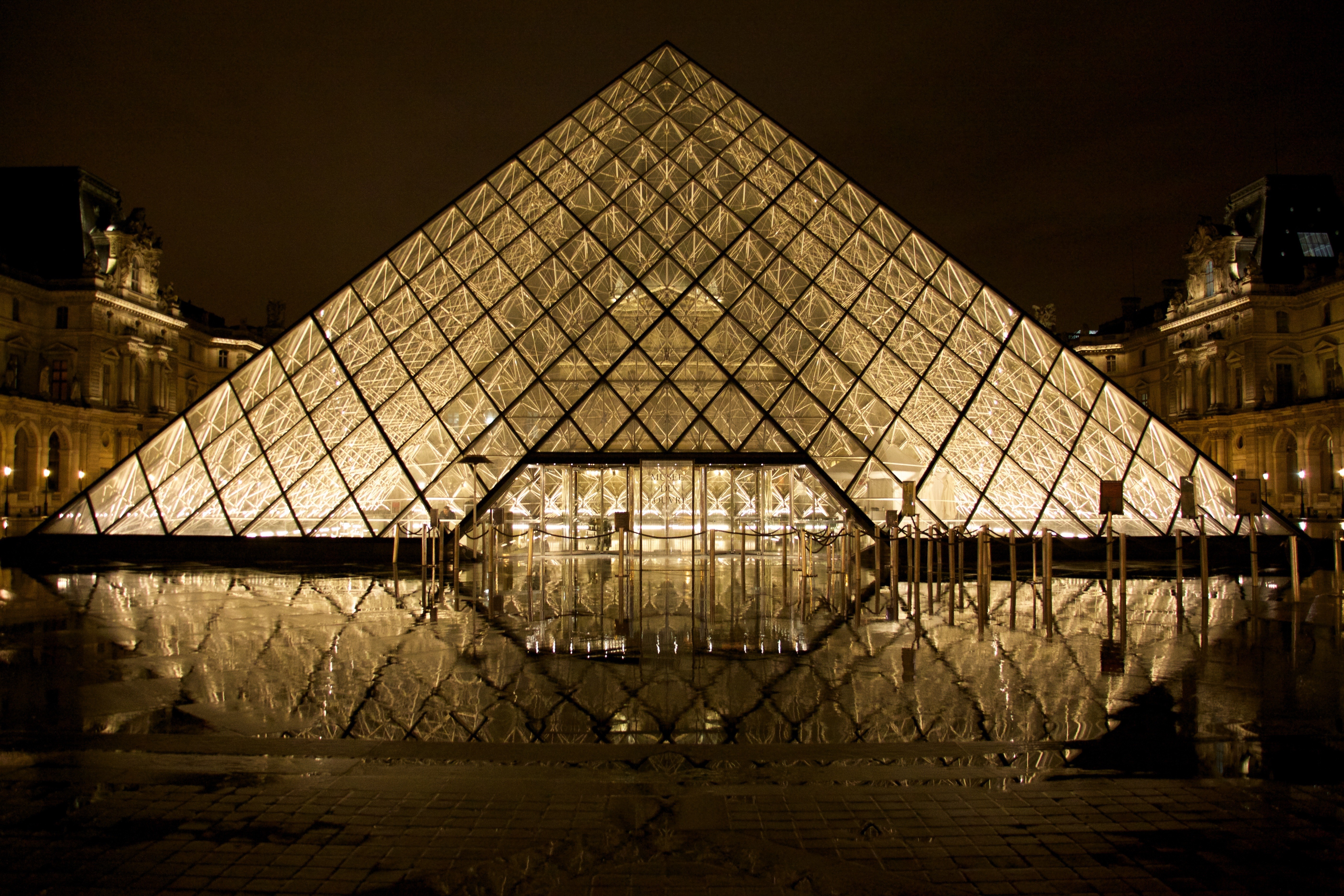 Louvre Pyramid at night with reflection HD Wallpaper