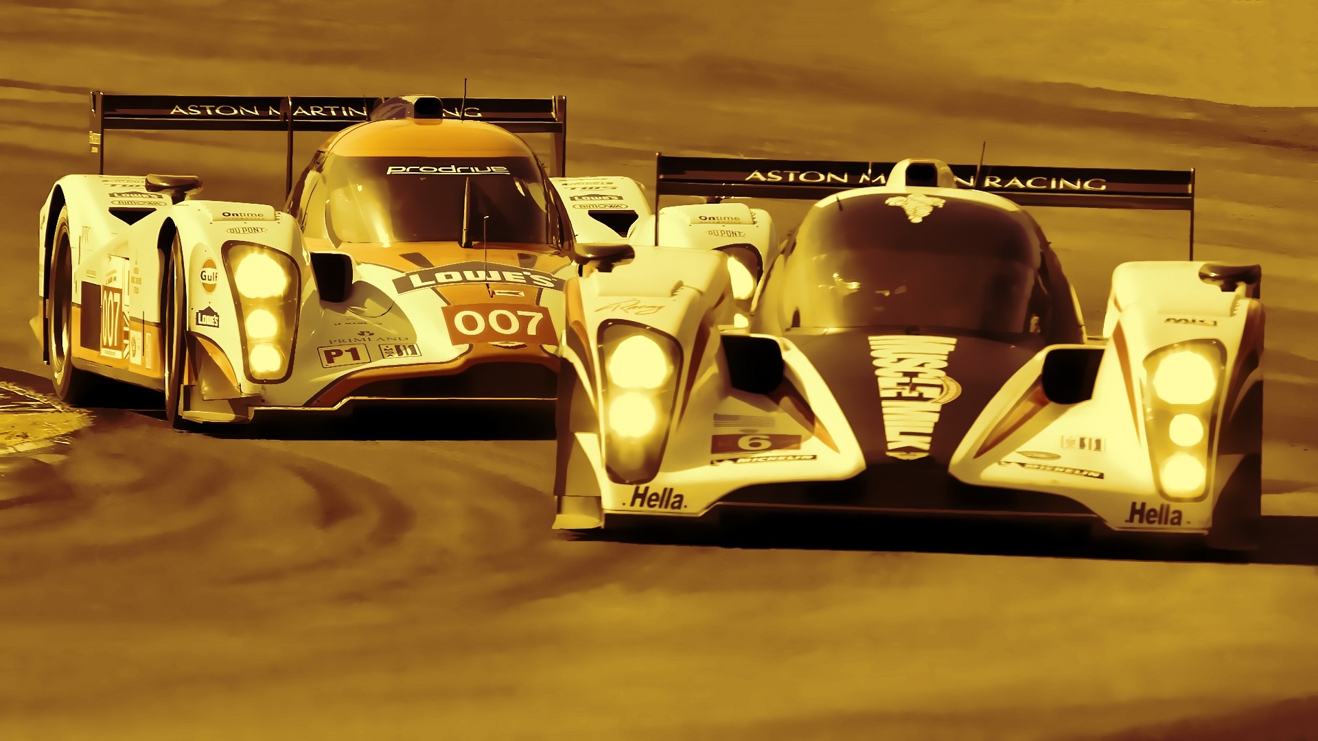 Aston Martin Racing cars on a track HD Wallpaper
