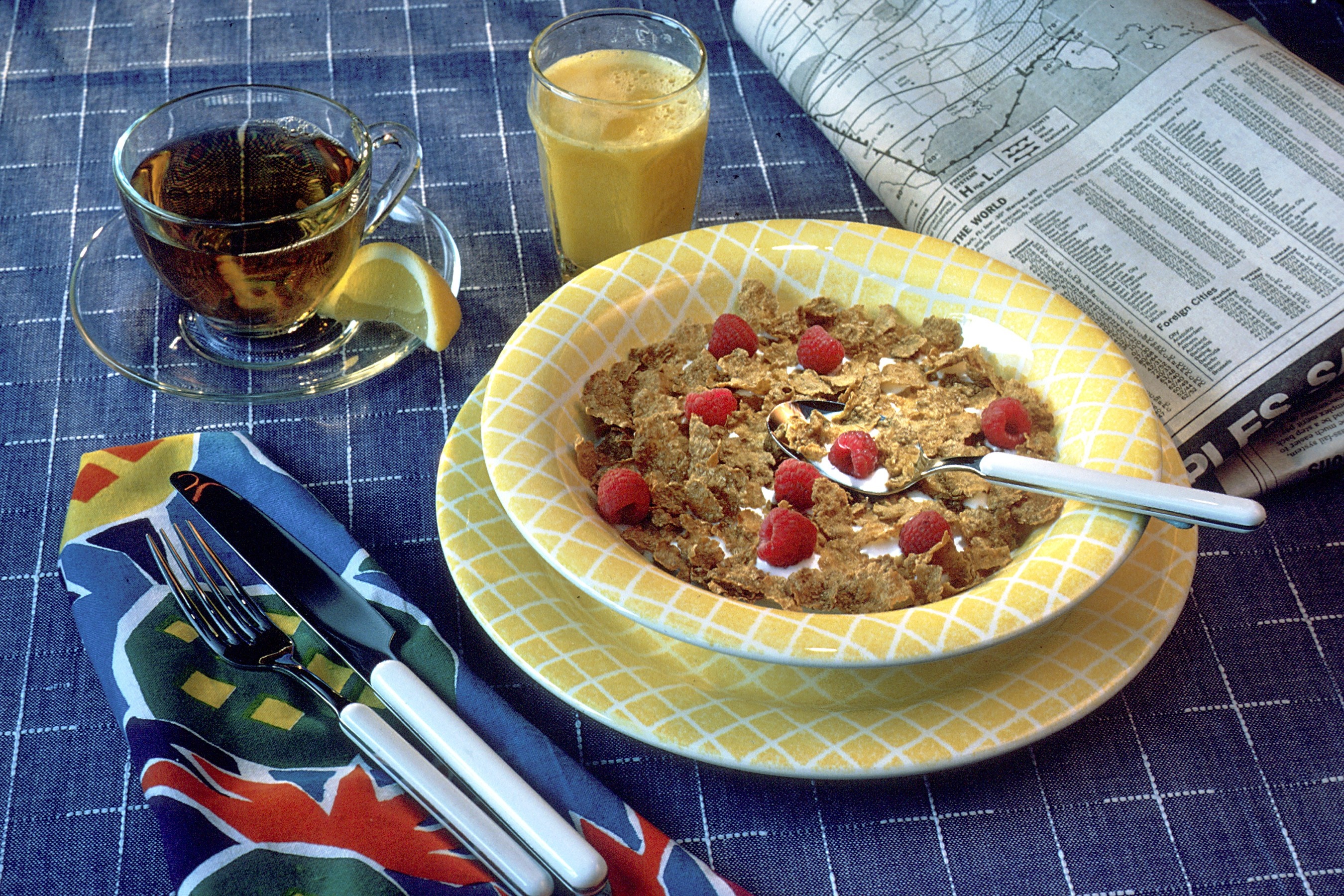 Breakfast with cereal, raspberries, tea, and orange juice HD Wallpaper