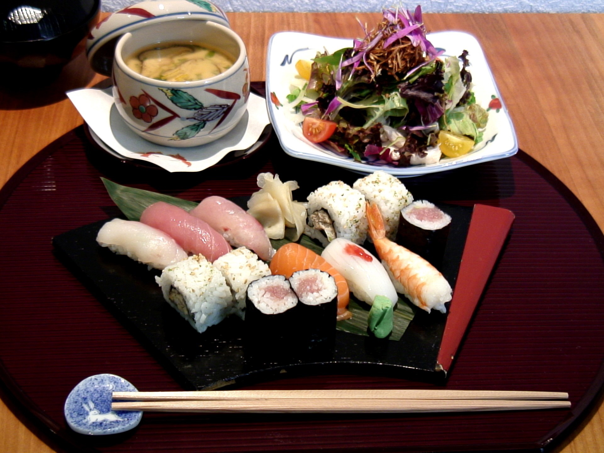 Japanese sushi meal with miso soup and salad HD Wallpaper