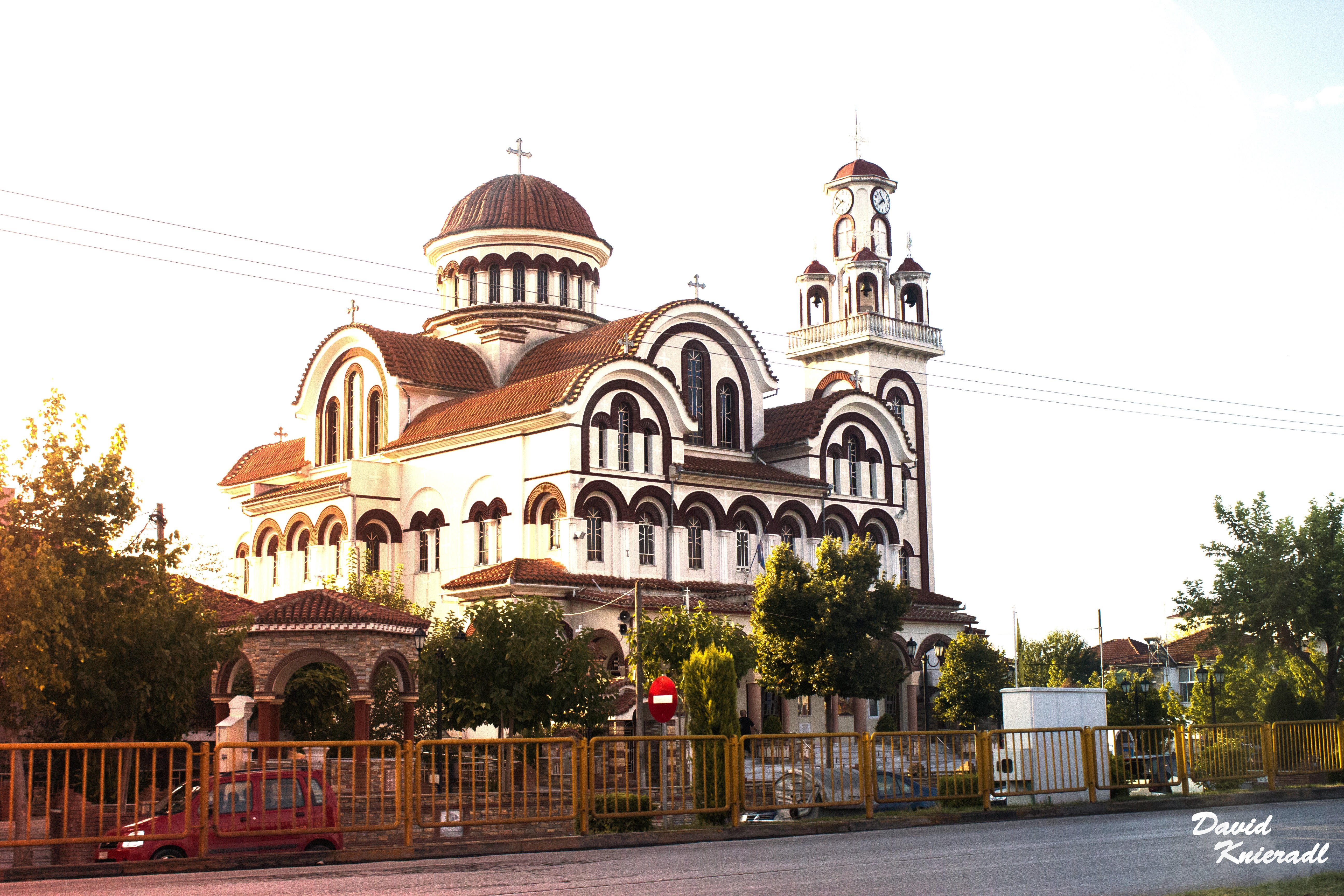 White church with red-tiled domes and bell tower HD Wallpaper