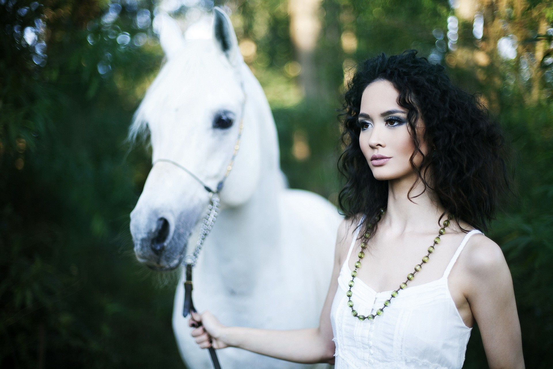 Woman with a white horse in a forest HD Wallpaper
