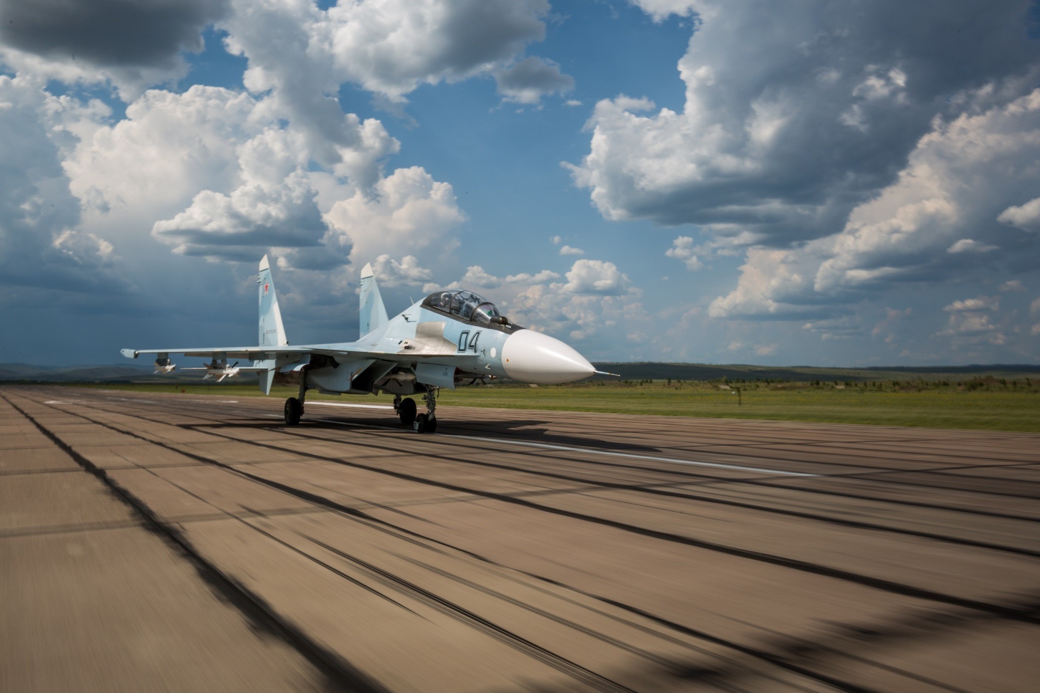 Sukhoi Su-30 fighter jet on a runway HD Wallpaper