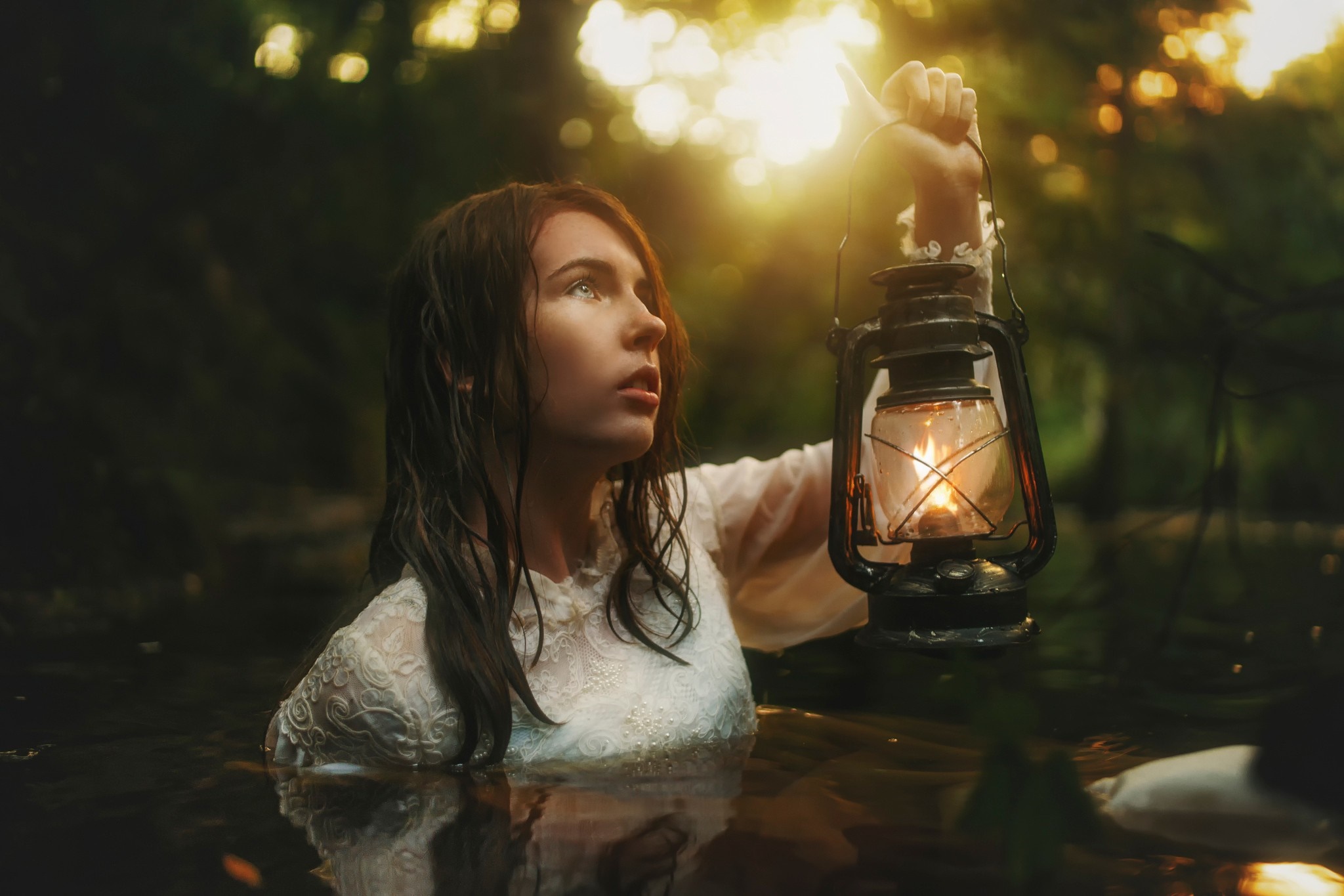 Woman in white dress holding a lantern in water HD Wallpaper