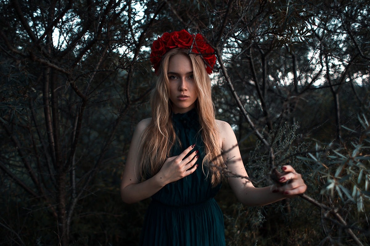 Woman with flower crown in dark forest HD Wallpaper