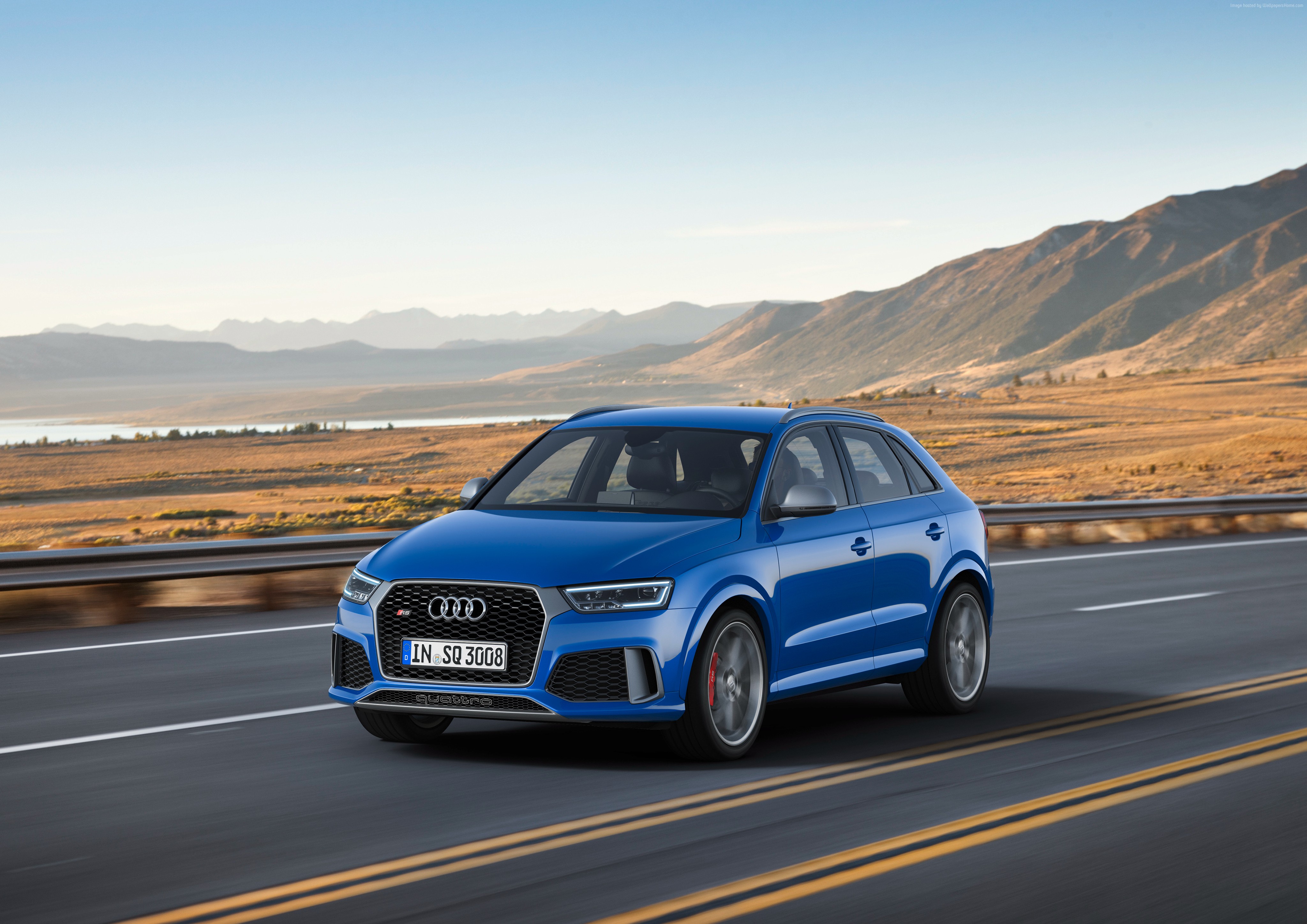 Blue Audi RS Q3 performance (8U) driving on a road HD Wallpaper