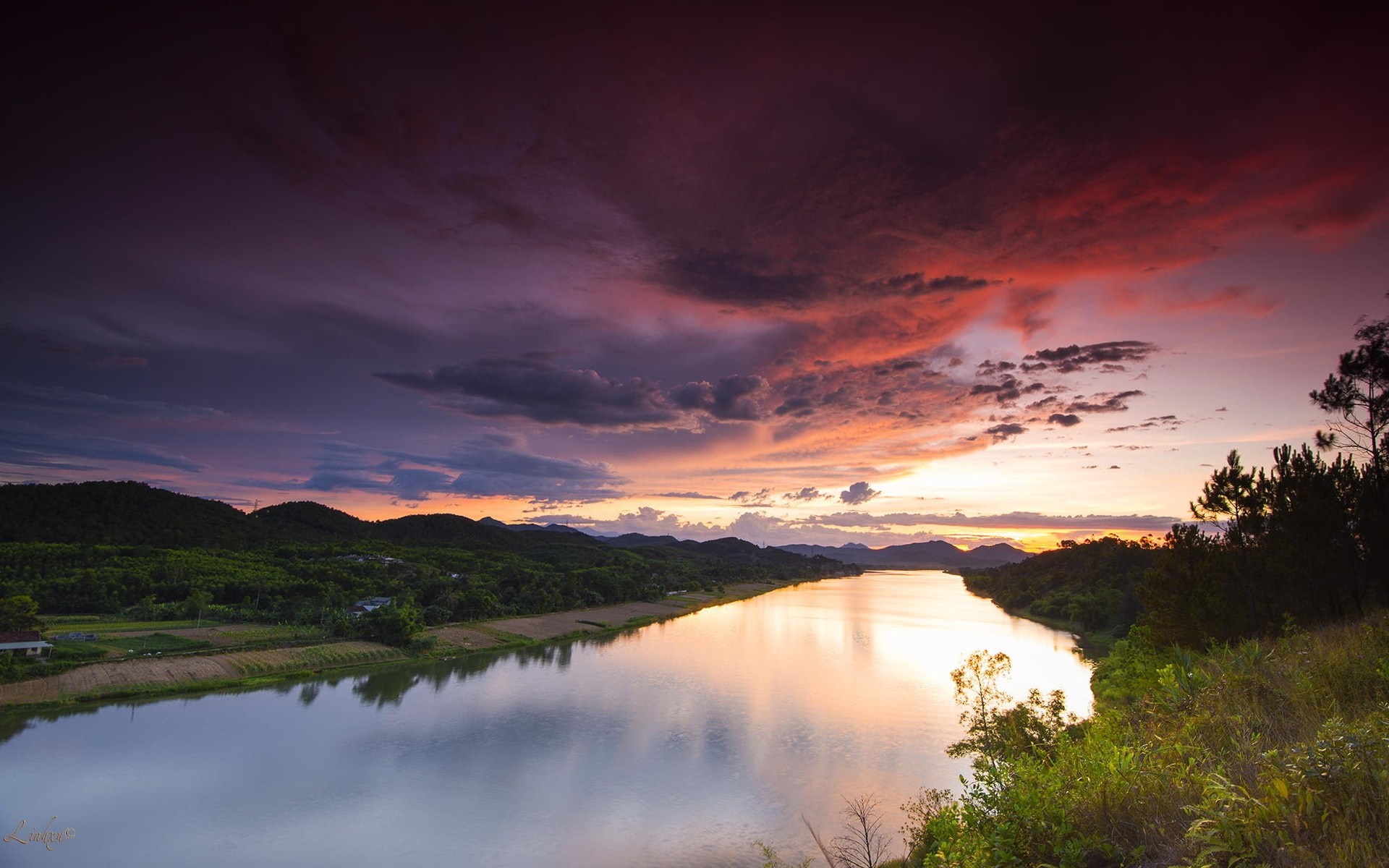 River landscape at sunset with dramatic clouds HD Wallpaper