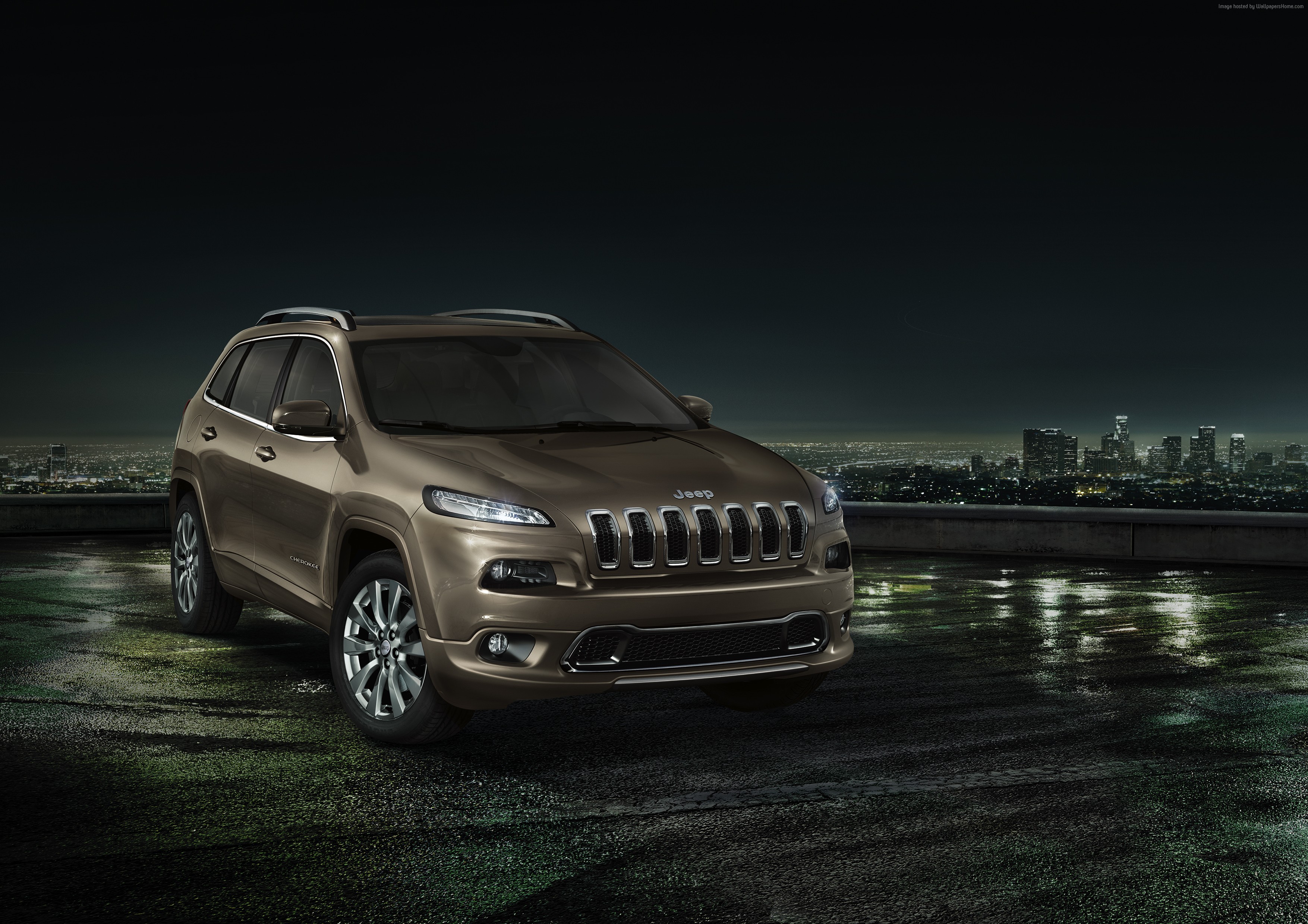 Jeep Cherokee Overland SUV on a rooftop at night HD Wallpaper