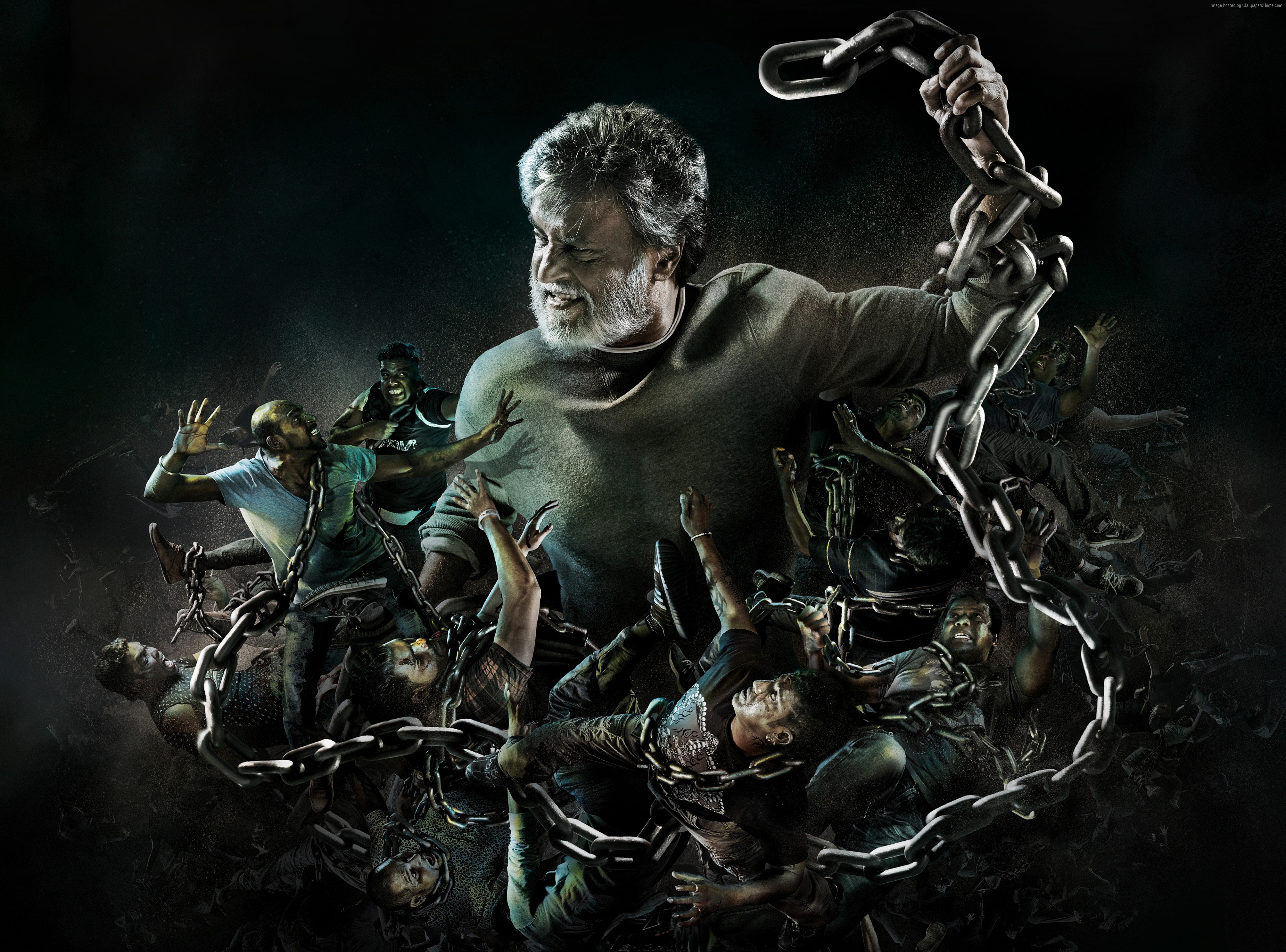 Rajinikanth from Kabali with chains and people HD Wallpaper