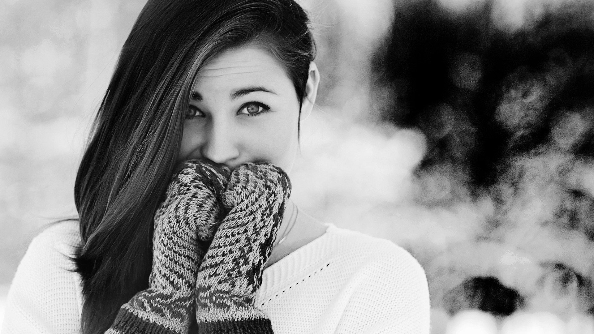Black and white portrait of a woman wearing mittens HD Wallpaper