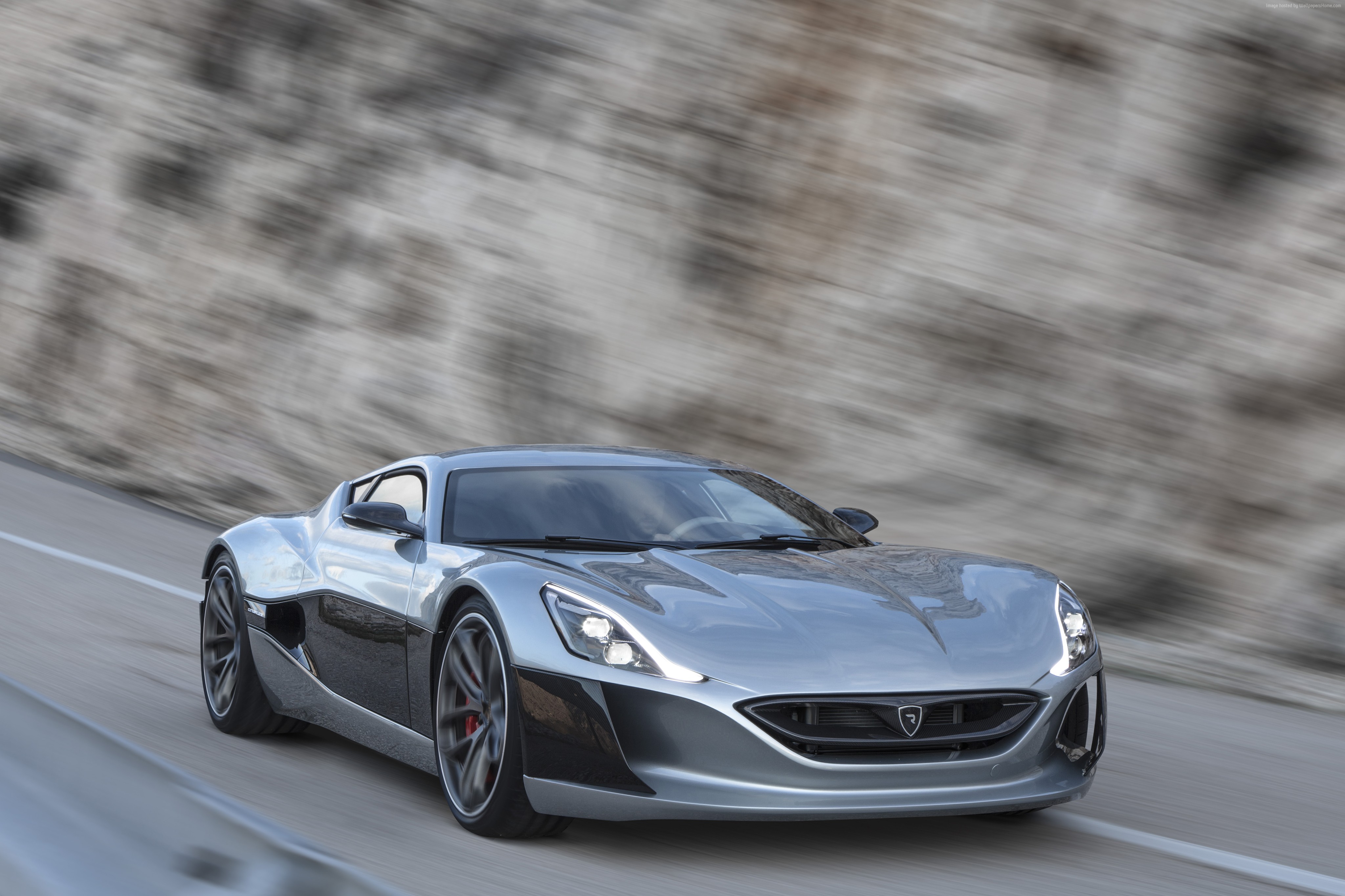 Silver Rimac Concept One ultra-light super car on road HD Wallpaper