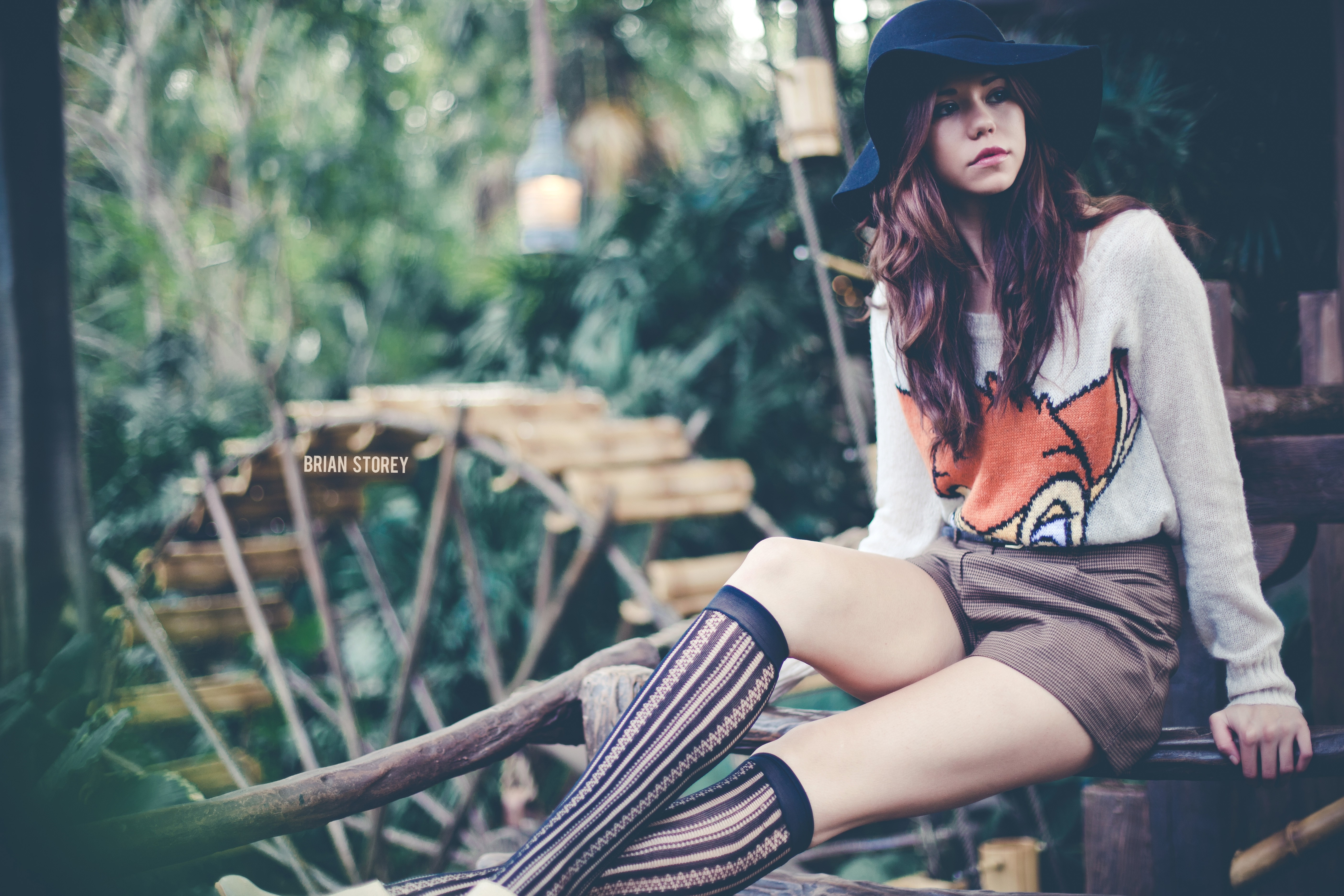 Woman wearing a sweater and shorts, photographed by Brian Storey HD Wallpaper
