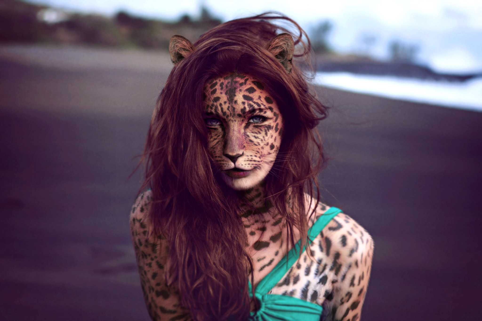 Woman with leopard face paint and ears on beach HD Wallpaper