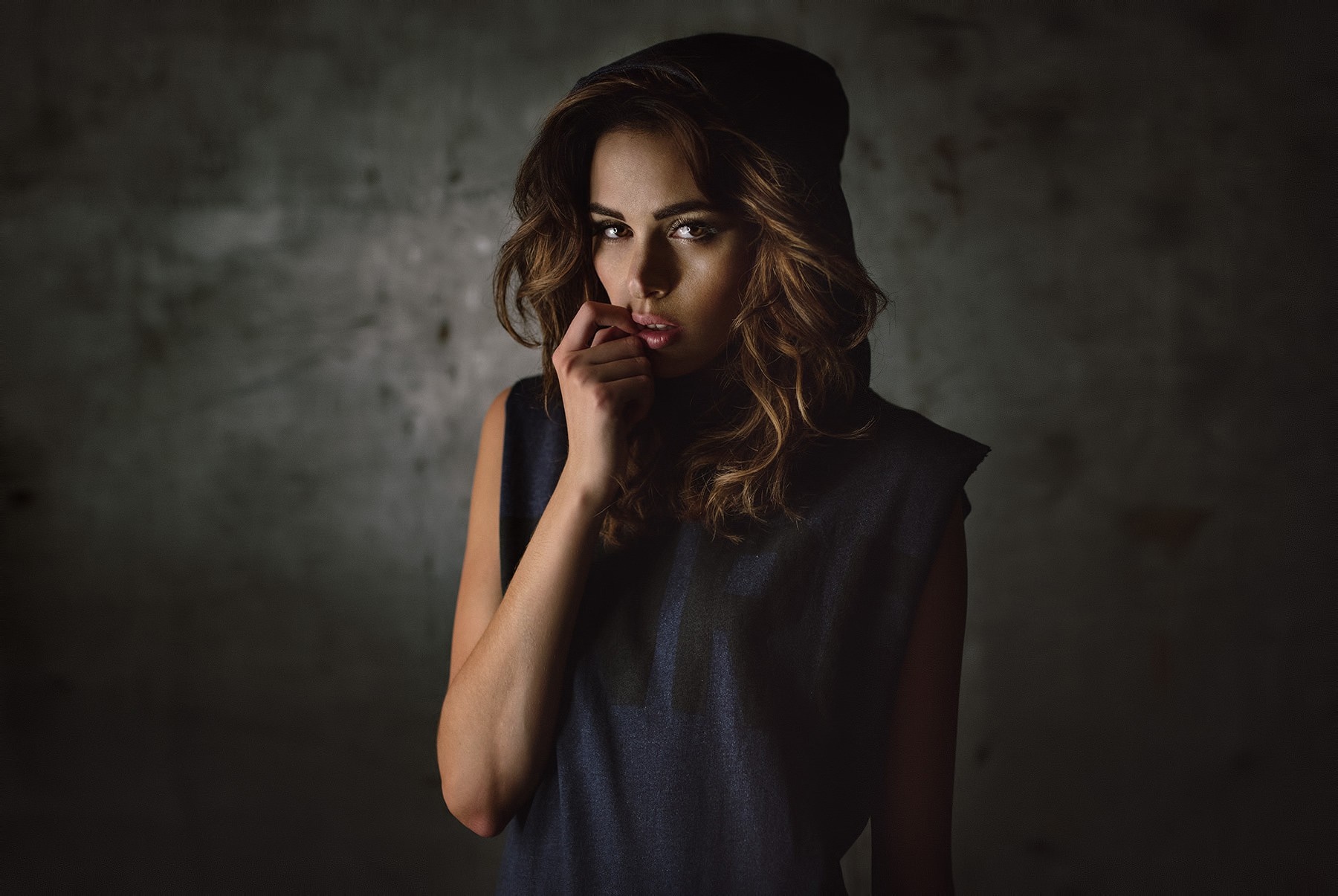 Woman in a black hoodie and sleeveless shirt HD Wallpaper