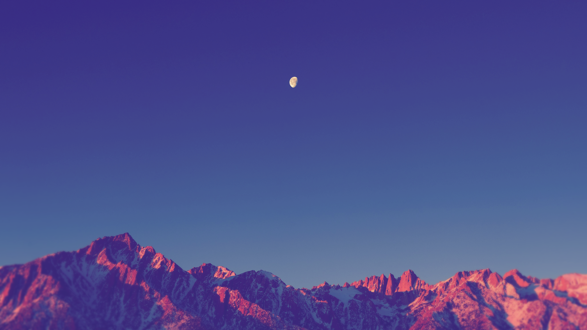 Moon over snow-capped mountains at sunset HD Wallpaper