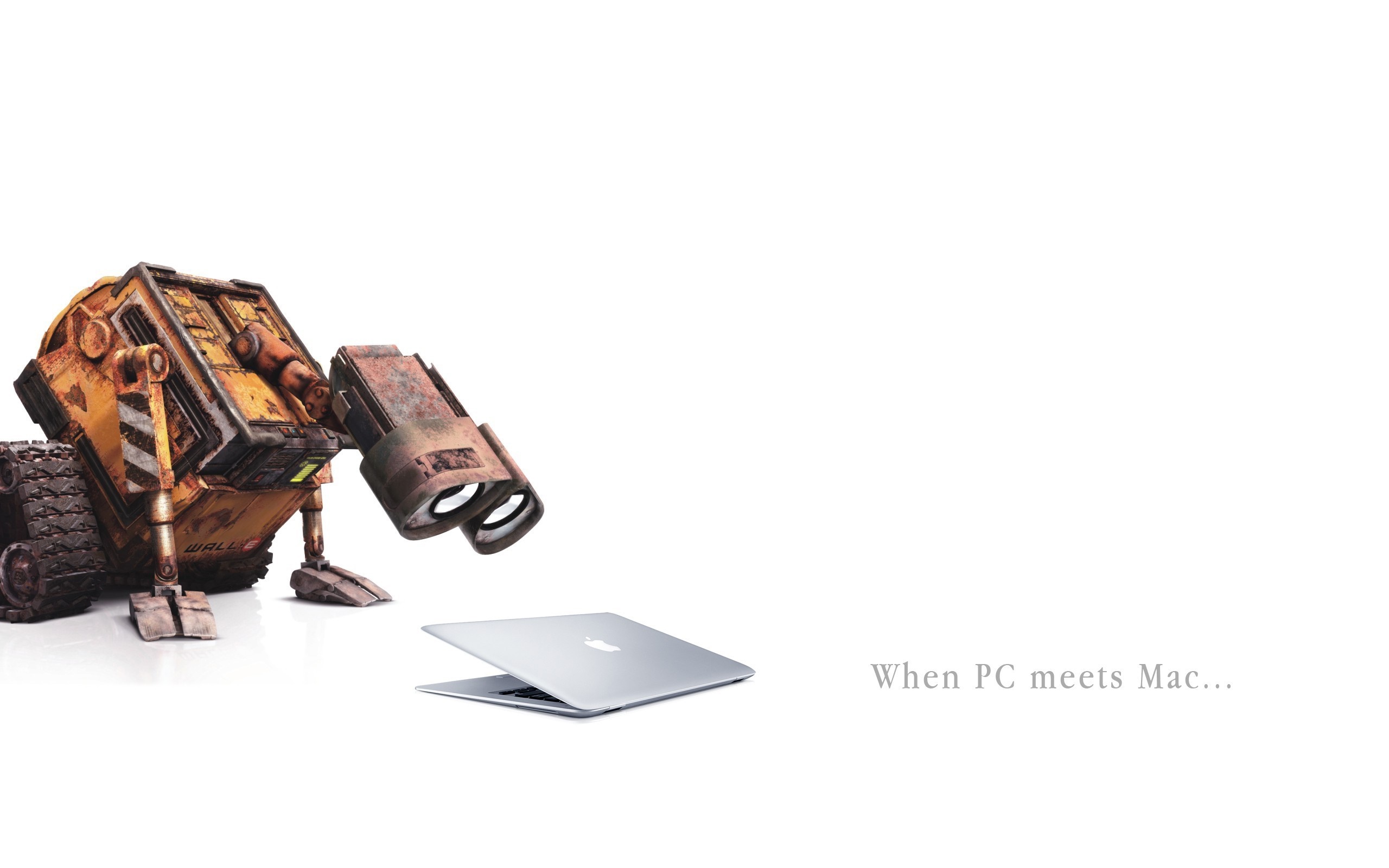 WALL-E looking at a MacBook HD Wallpaper