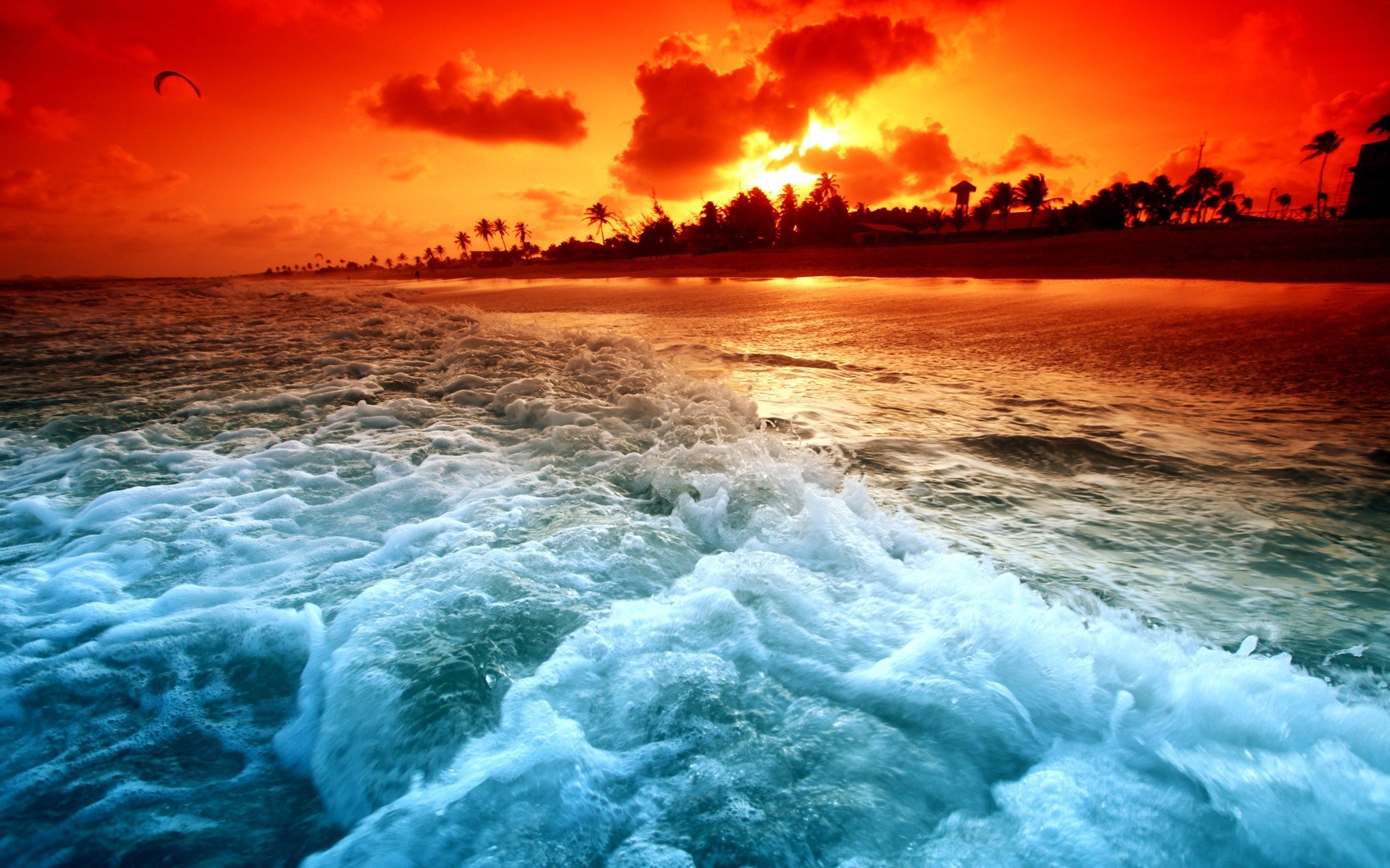 Sunset over a tropical beach with crashing waves HD Wallpaper