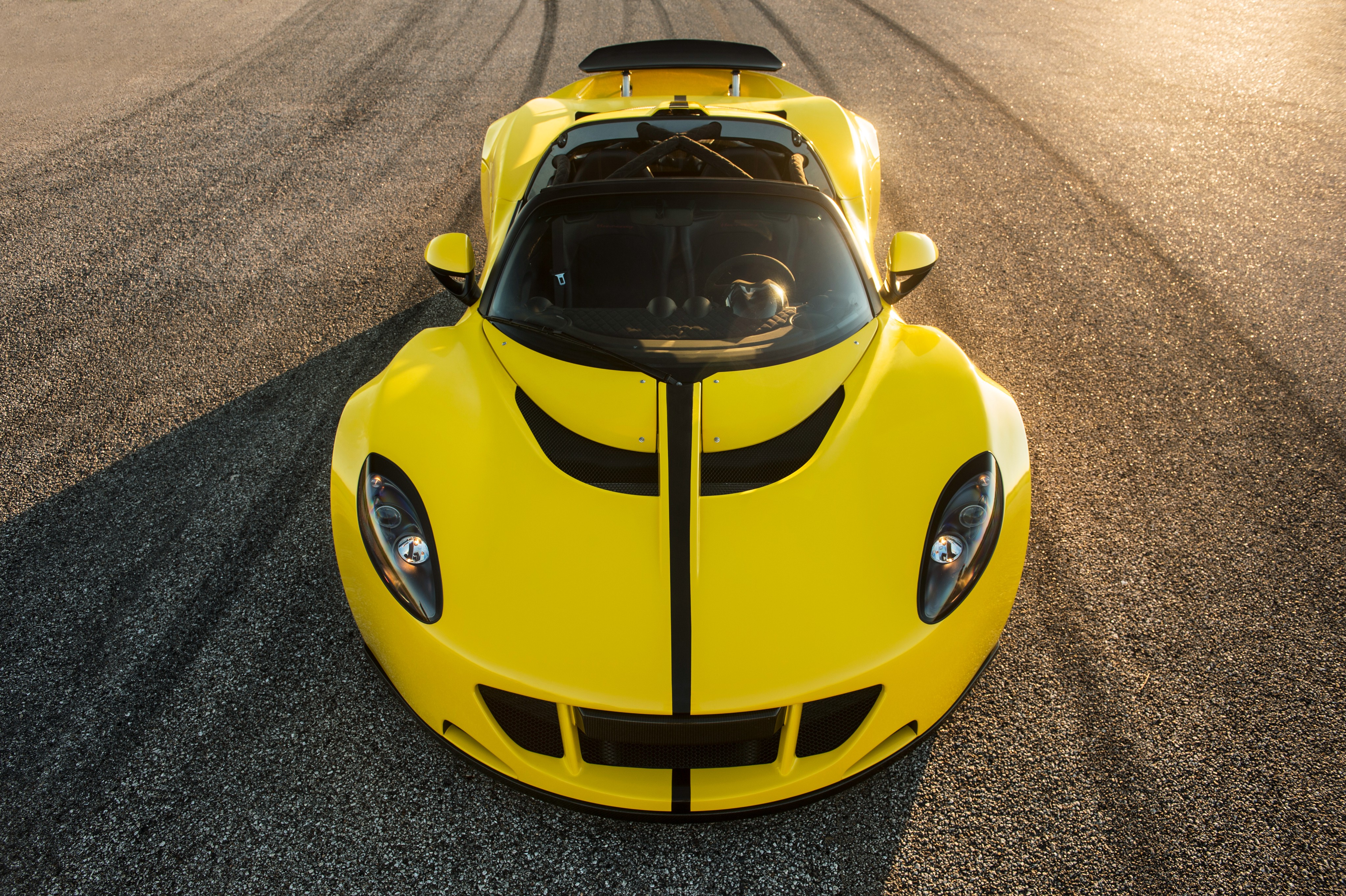 Yellow Hennessey Venom GT Spyder on asphalt HD Wallpaper