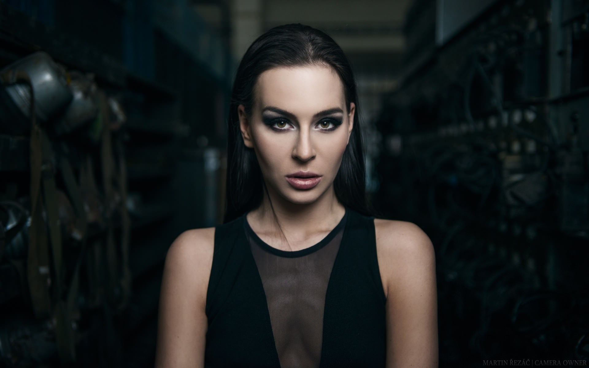 Woman with dark makeup in a black dress HD Wallpaper